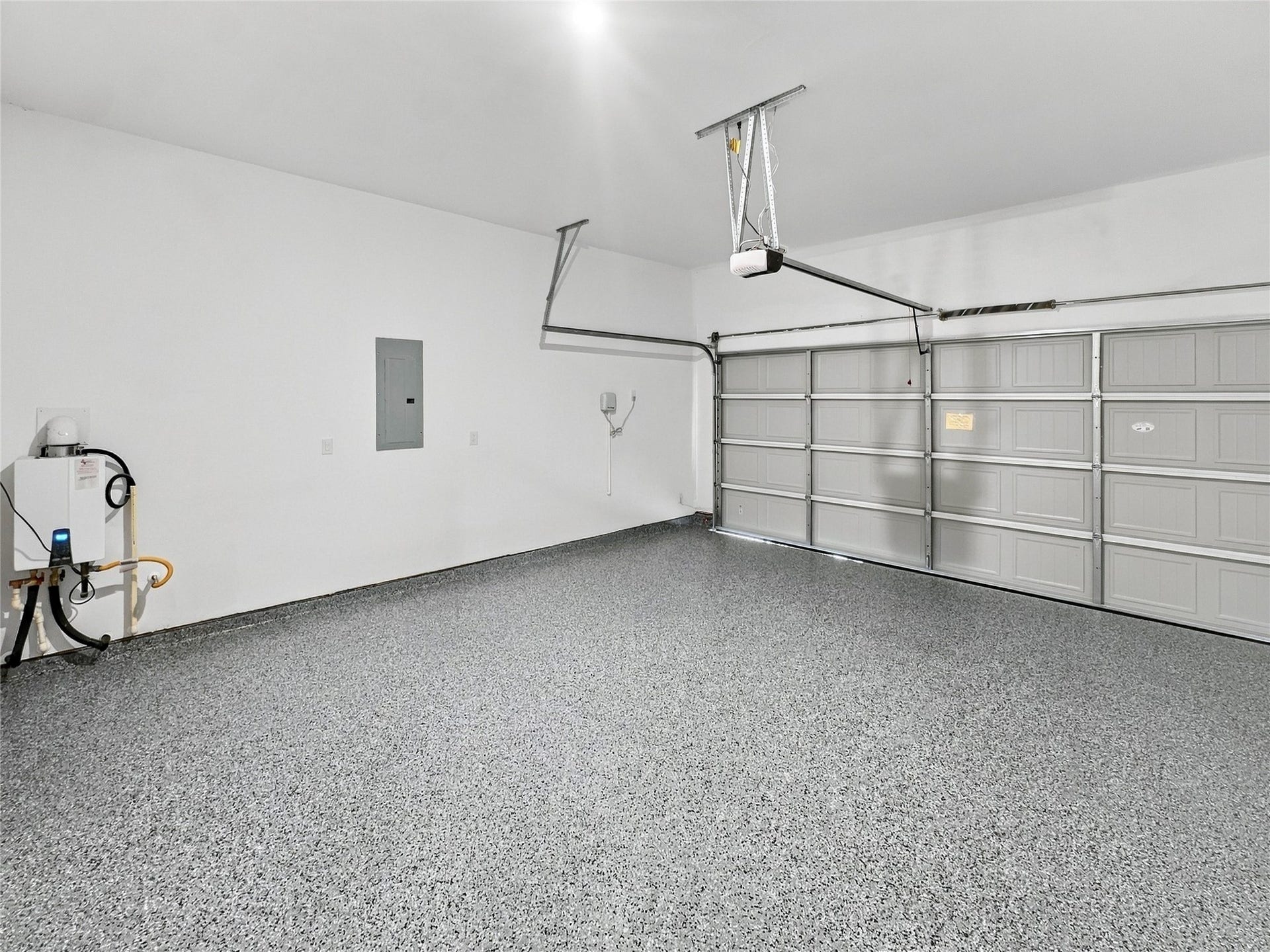 26607 Golden Heather Lane, Katy, TX 77493 2-car garage with coated floor and tankless water heater