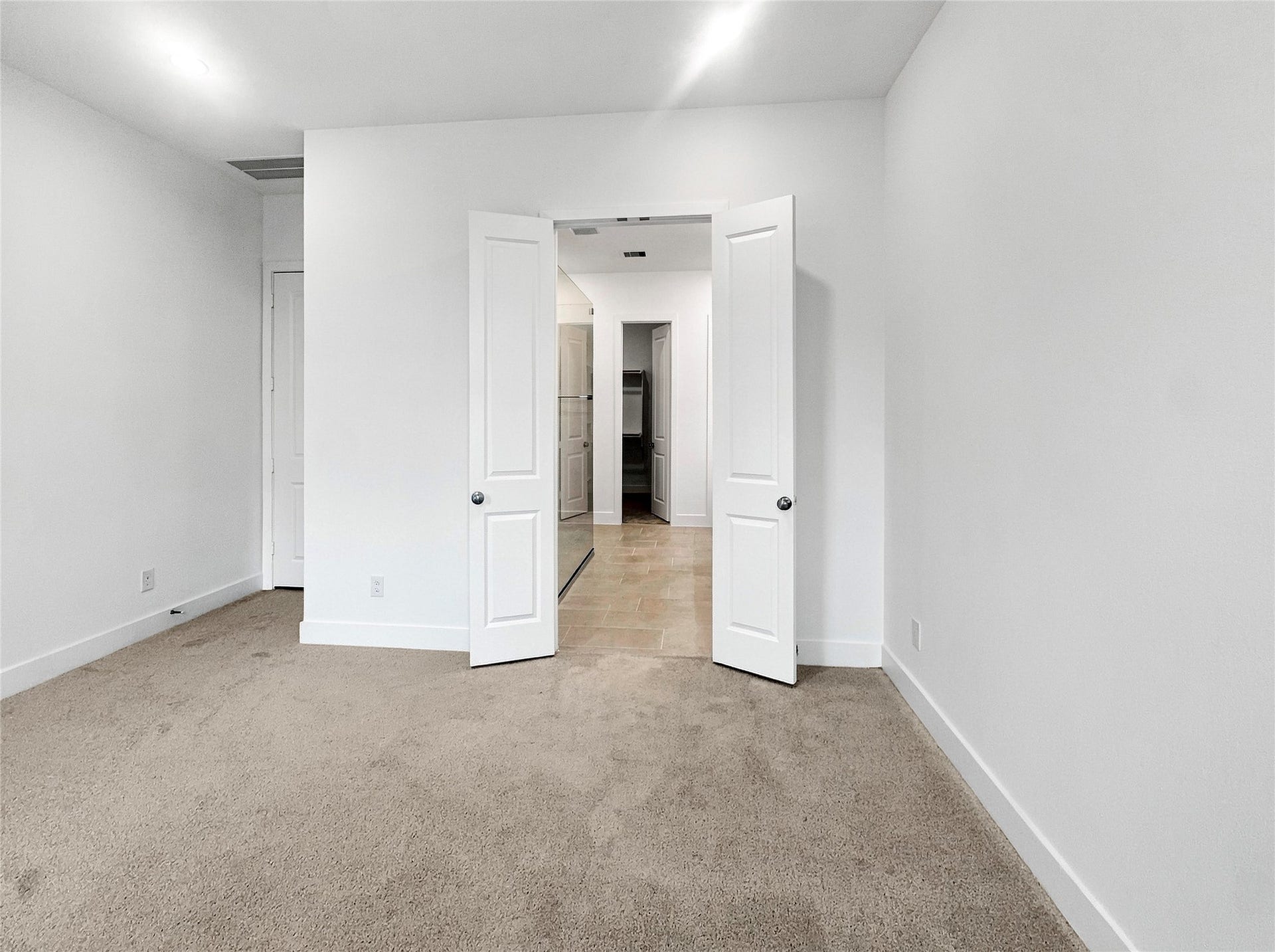 26607 Golden Heather Lane, Katy, TX 77493 Primary suite with double doors to the bath
