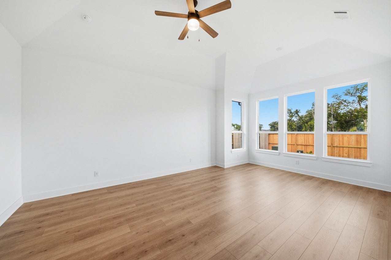 1535 Watermont Drive, Missouri City, TX 77459 Private primary suite with vaulted ceilings, oversized windows, and plenty of room to unwind.