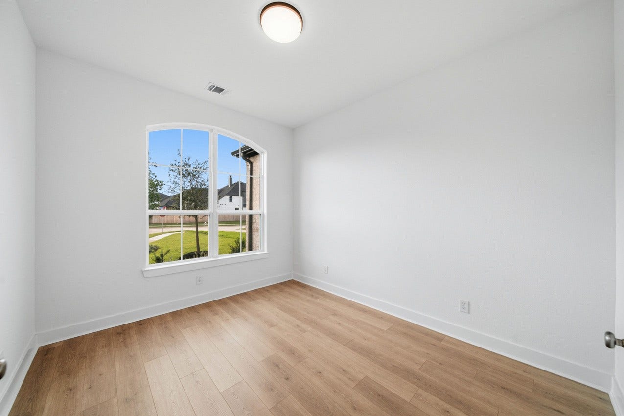 1535 Watermont Drive, Missouri City, TX 77459 Private study with large windows, ideal for a home office, library, or flex space.