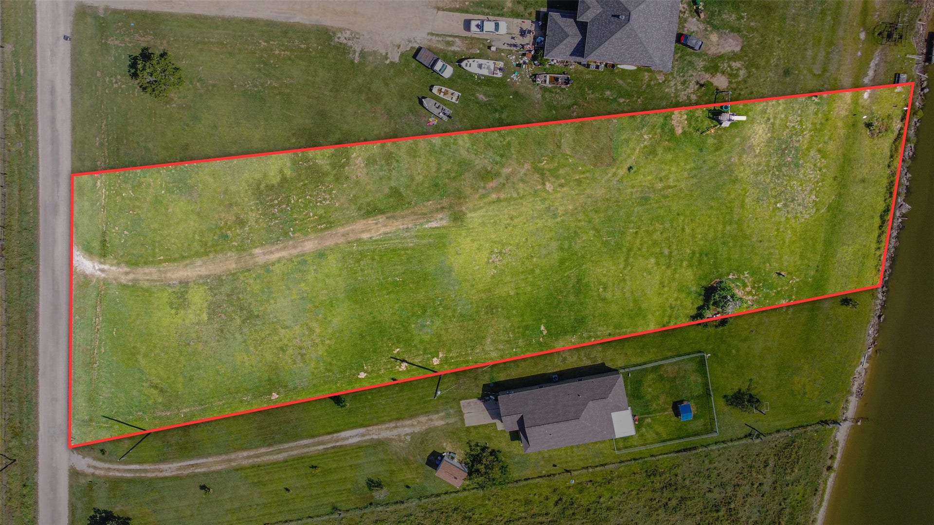 0 S Redfish Drive, Hitchcock, TX 77563 Aerial view of the 1.2 acre canal frontage lot