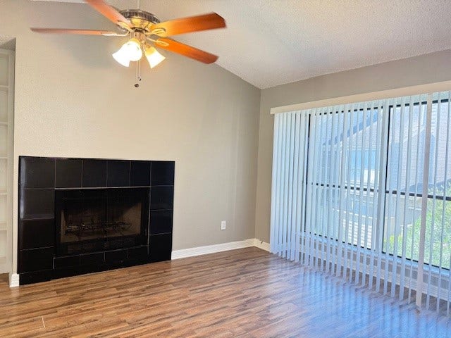 6701 Sands Point Drive, #26, Houston, TX 77074 Large window with view of the tree tops.