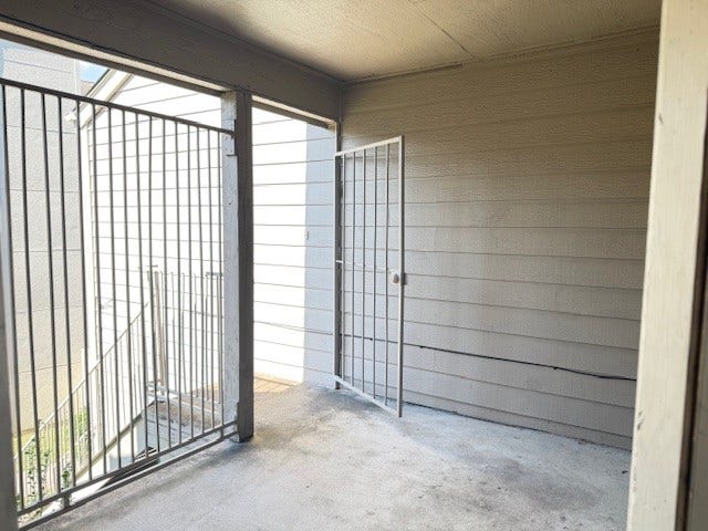 6701 Sands Point Drive, #26, Houston, TX 77074 Enclosed balcony at front door. Enjoy this private outdoor space.