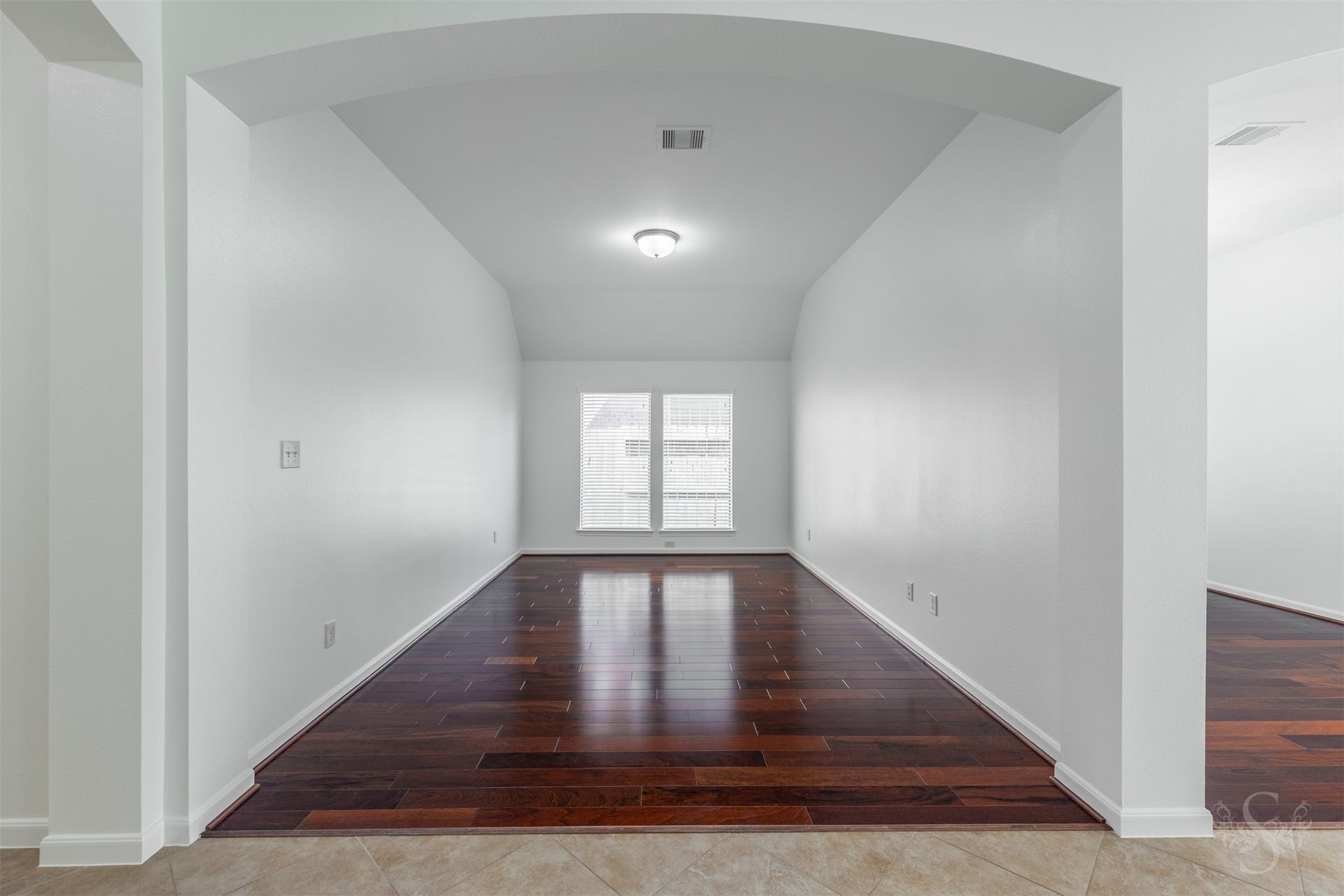 28015 Barberry Banks Lane, Fulshear, TX 77441 The study offers a versatile space for working from home, enjoying hobbies or relaxing with a good book. Gorgeous wood flooring and a wall of windows create a warm, comfortable setting with plenty of natural light.