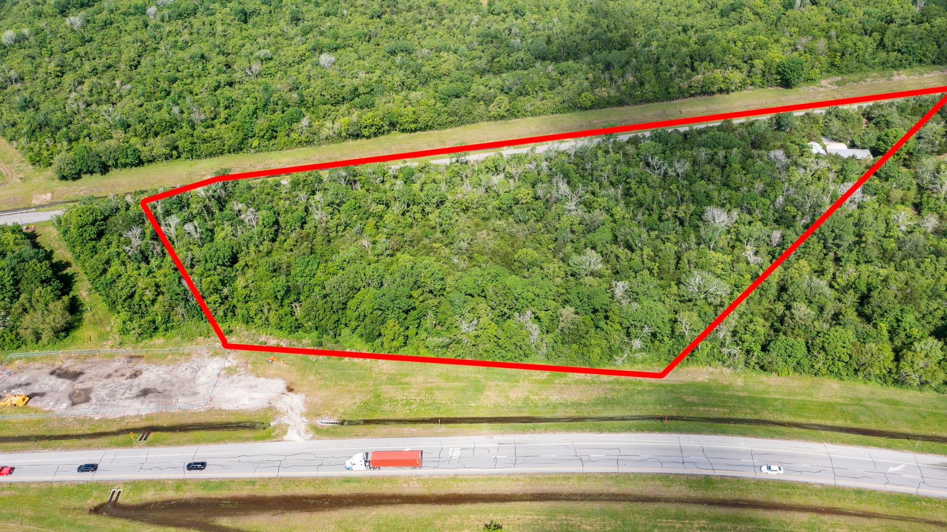 Red property lines are approximate location