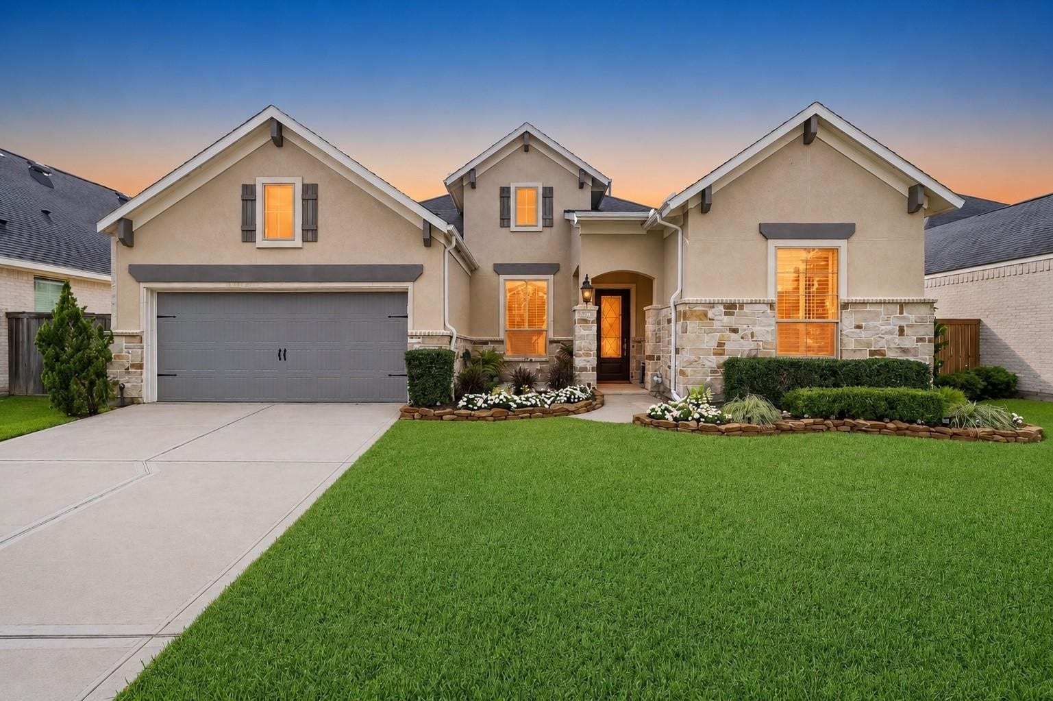 3411 Dover Valley Drive, Houston, TX 77059 Front Elevation. Grass is digitally enhanced.