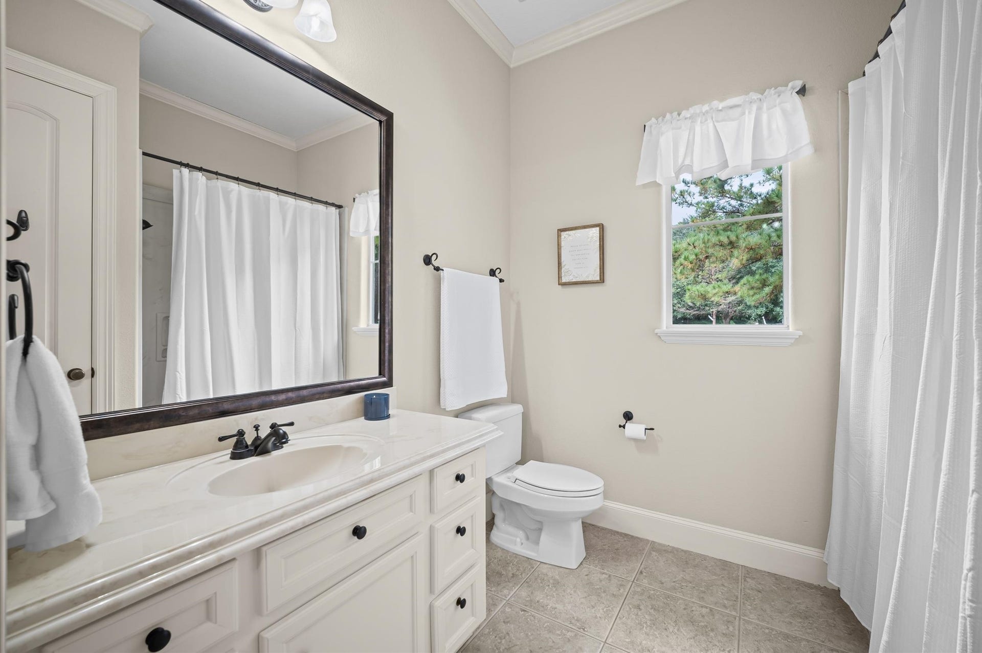 25815 Bridle Creek Drive S, Magnolia, TX 77355 Guest bathroom.