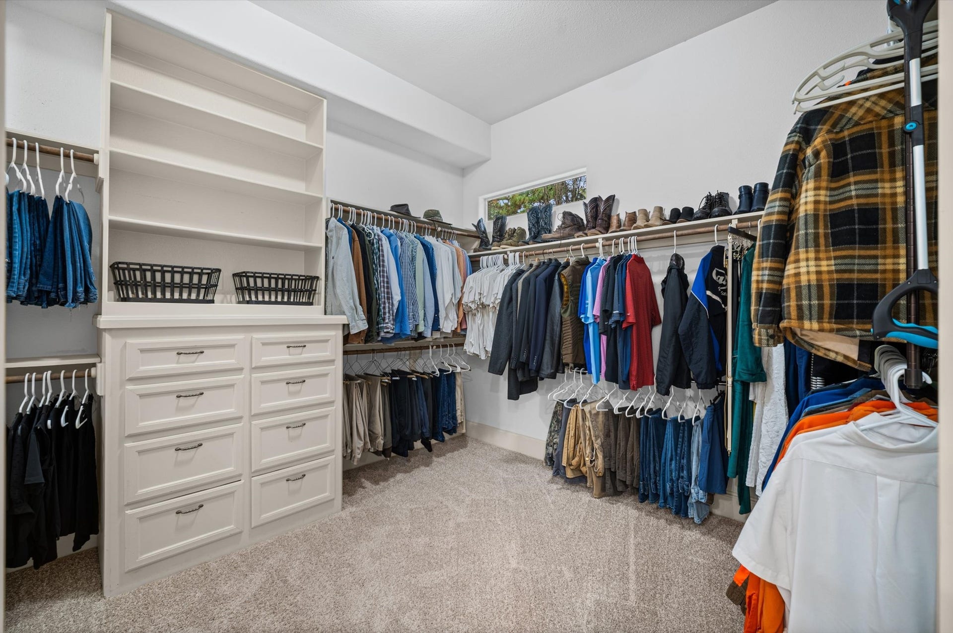 25815 Bridle Creek Drive S, Magnolia, TX 77355 Generous walk-in primary closet with built-in shelving and drawers