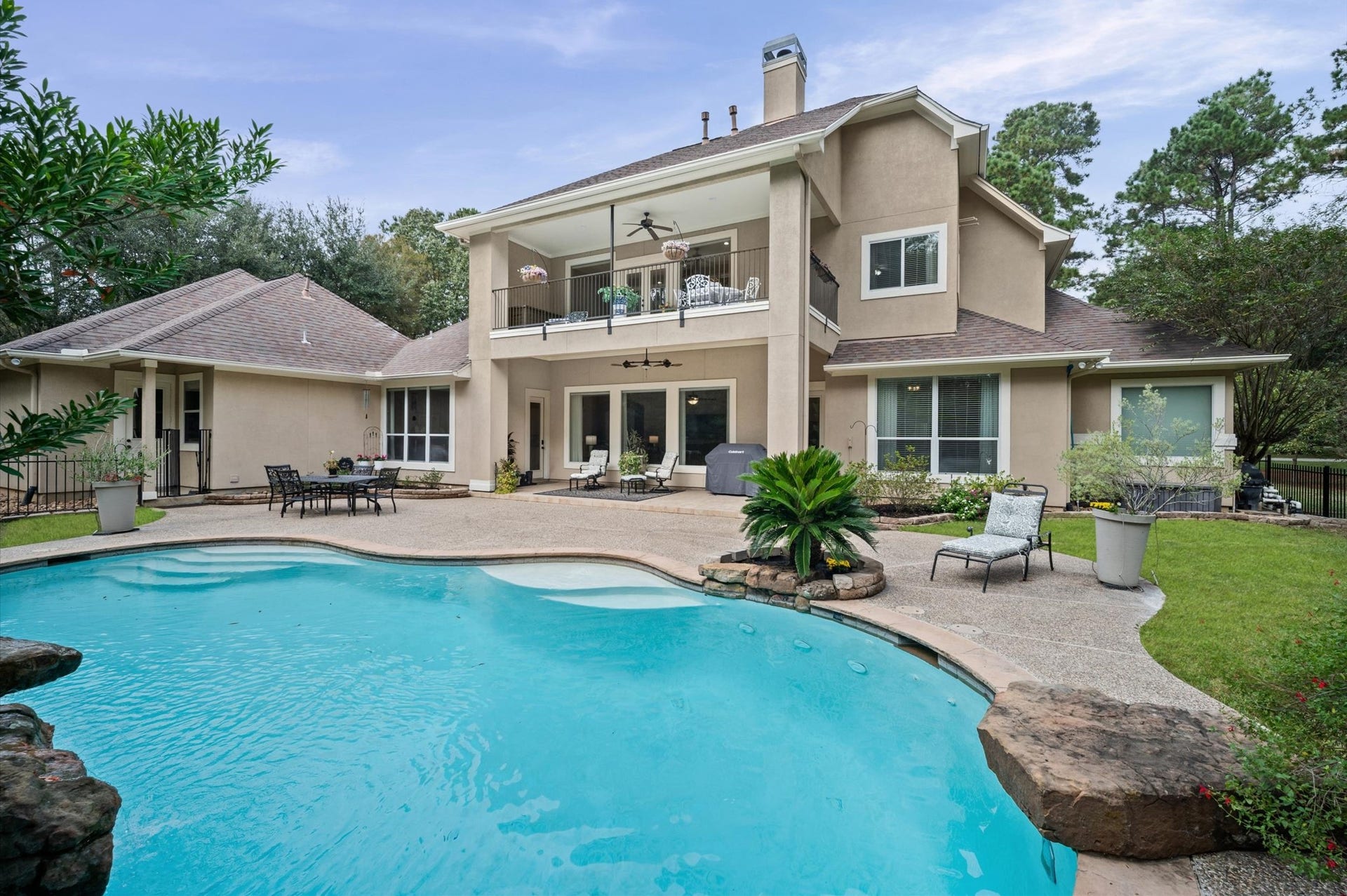 25815 Bridle Creek Drive S, Magnolia, TX 77355 Beautiful backyard retreat with sparkling pool and covered patio