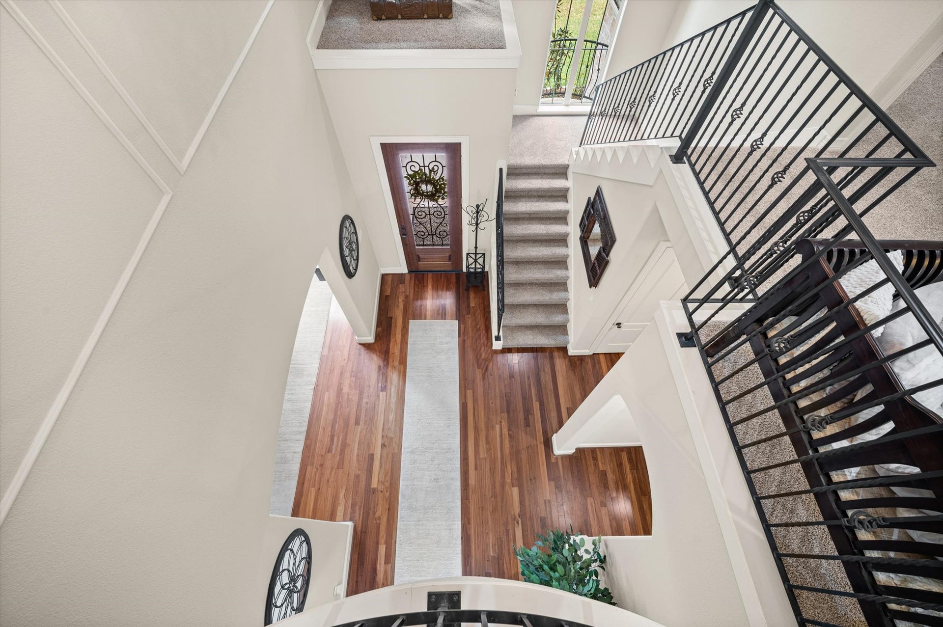 25815 Bridle Creek Drive S, Magnolia, TX 77355 Beautiful overhead view of the home's open staircase and entryway