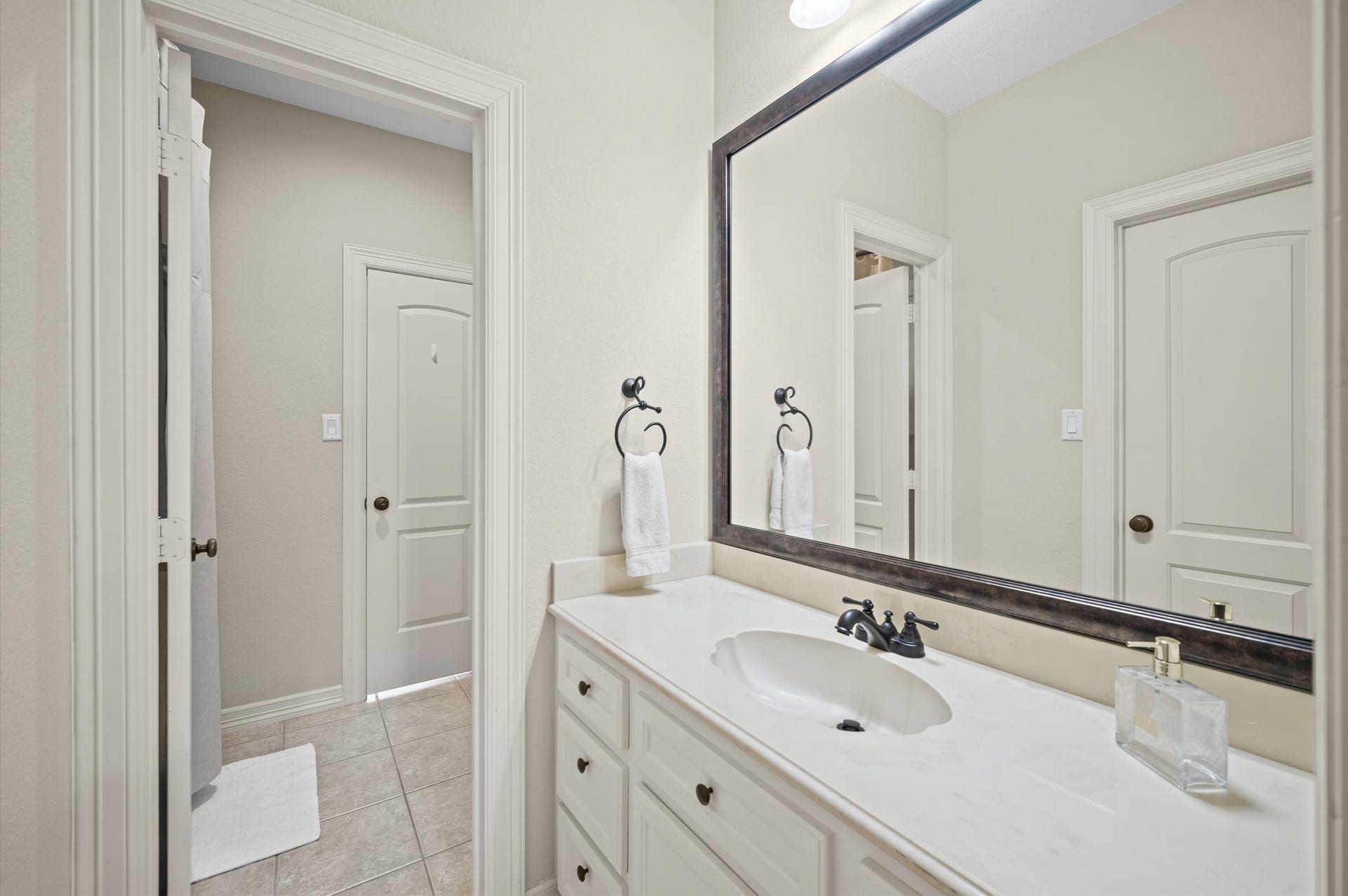 25815 Bridle Creek Drive S, Magnolia, TX 77355 Upstairs full Bathroom featuring an extended vanity and generous counter space