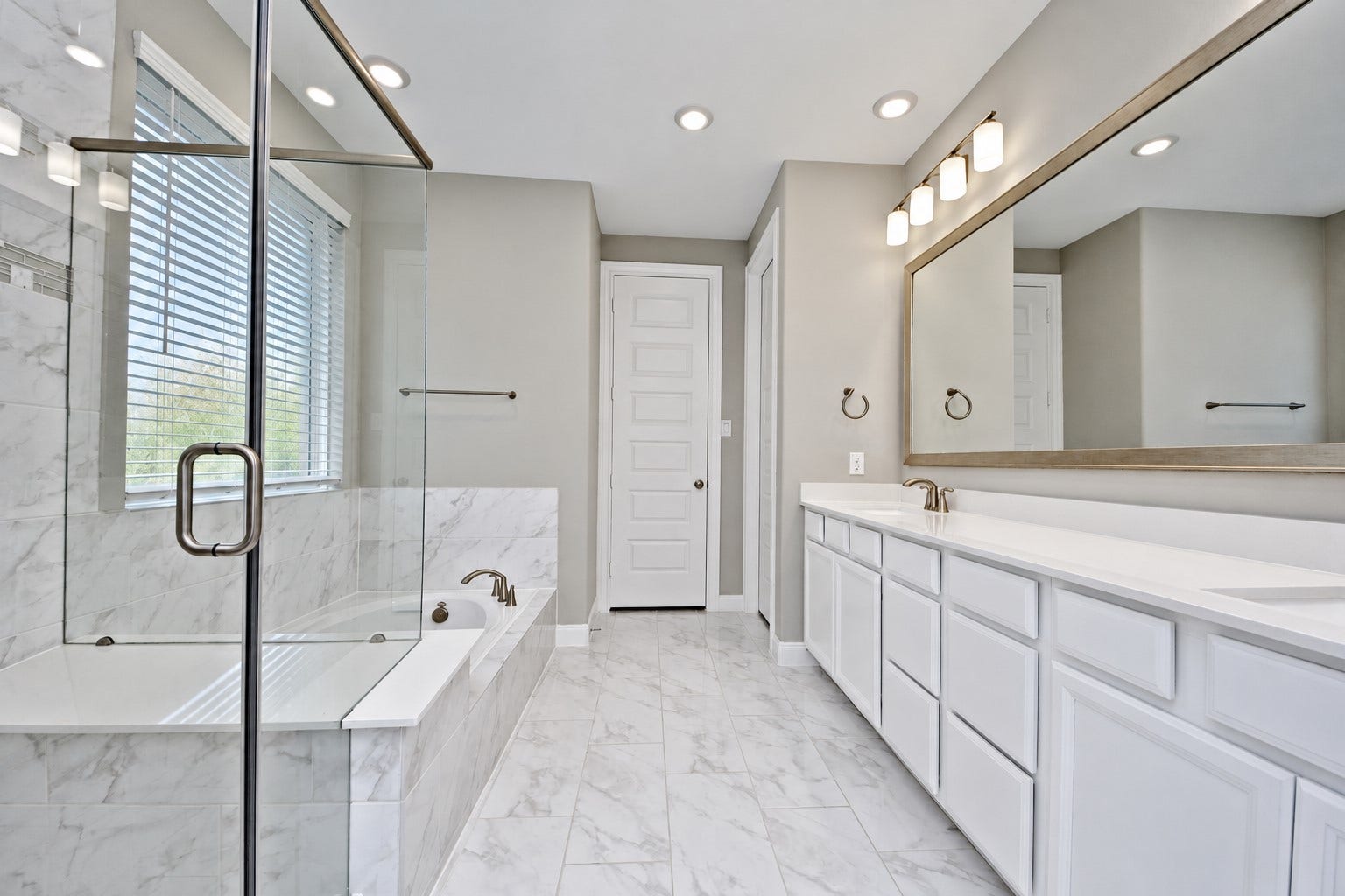 4314 Shaded Arbor Way, Sugar Land, TX 77479 Wow! Now this Primary Suite Bathroom has that Wow Factor throughout! Look at all those Cabinets and Draws for all your storage need!