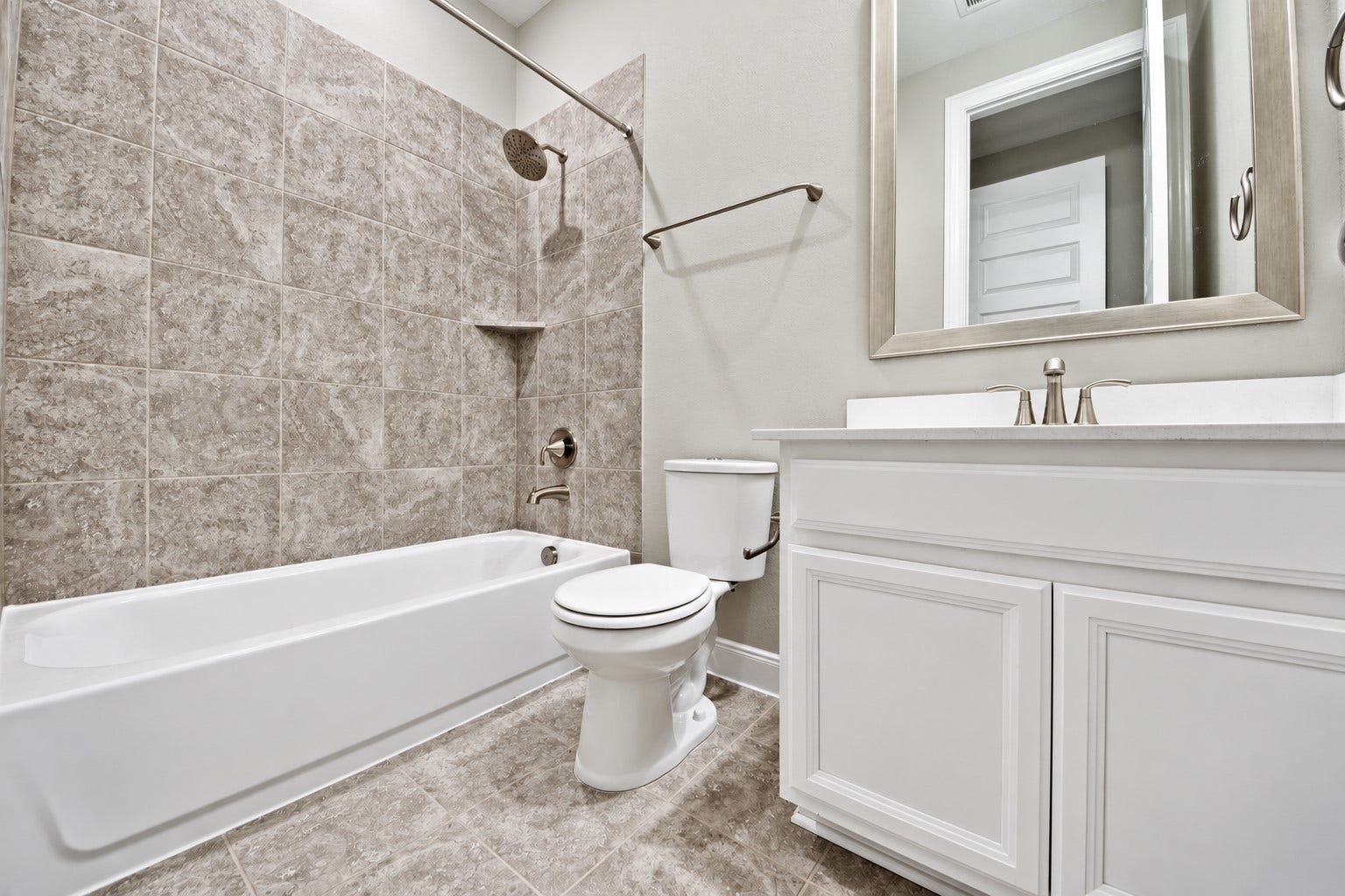 4314 Shaded Arbor Way, Sugar Land, TX 77479 Guest Bathroom on the Right Hand Side has Upgraded Vanity with Deep Under-mount Sink, Beautiful Quartz Counter Tops, Tug and Shower Combination with Upgraded Tile Surroundings! All Bathrooms feature: High-Performance Toilets, Water-Efficient Faucets and Flow-Smart Shower-heads!