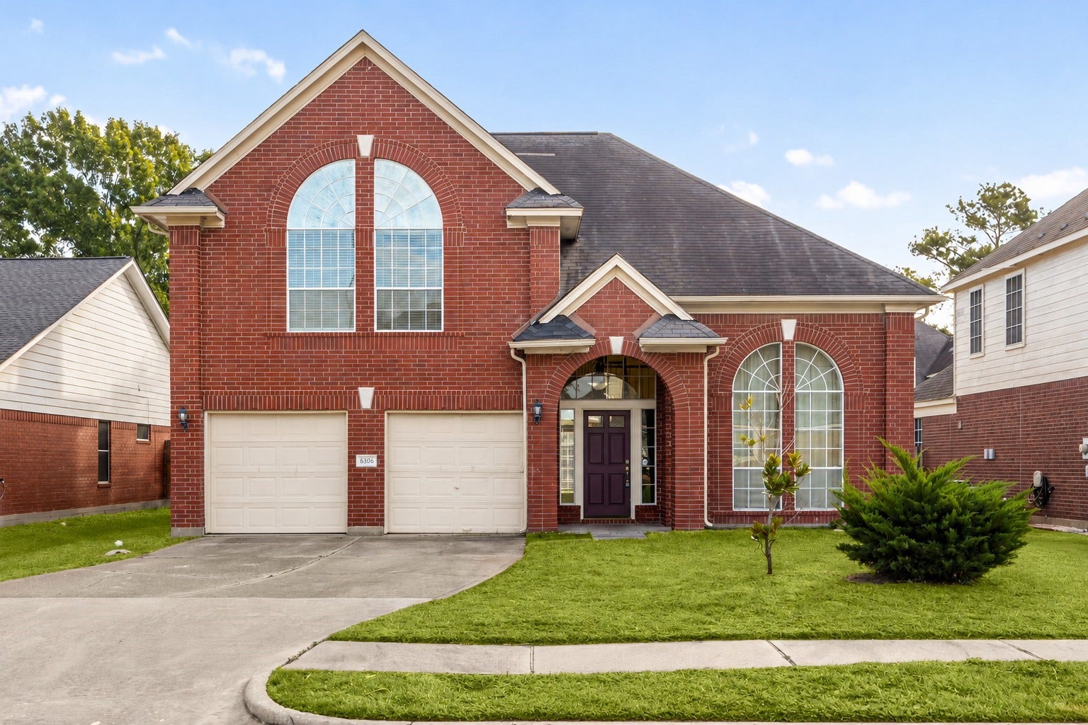 6306 Pago Lane, Houston, TX 77041 Welcome to 6306 Pago Lane, a stunning two-story home in the desirable Concord Bridge North community, offering elegant curb appeal with classic brick elevation and arched window details.