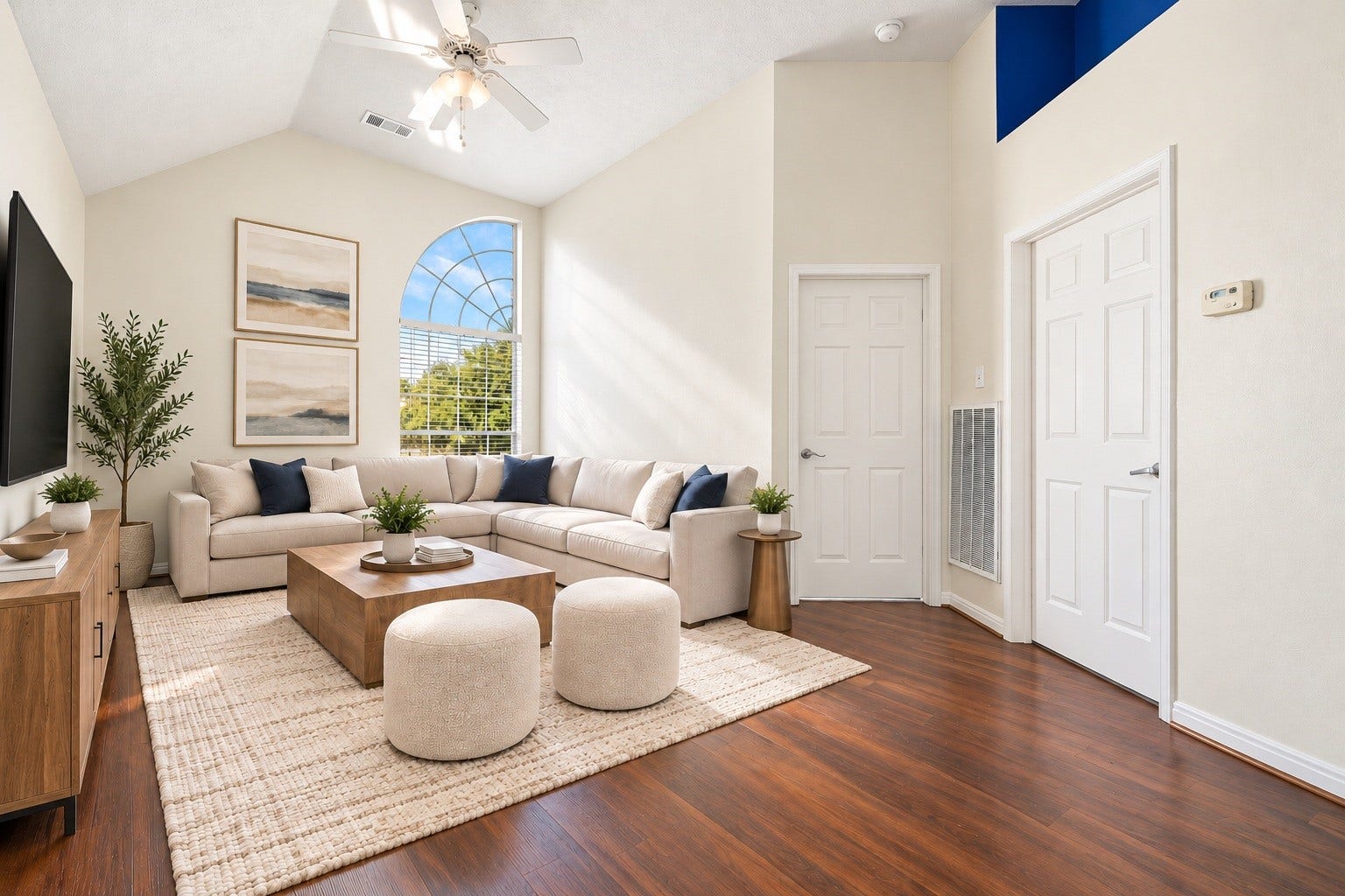 6306 Pago Lane, Houston, TX 77041 Upstairs, the spacious game room offers a dramatic arched window and vaulted ceiling, ideal for a media space, playroom, or second living area. Virtually staged.