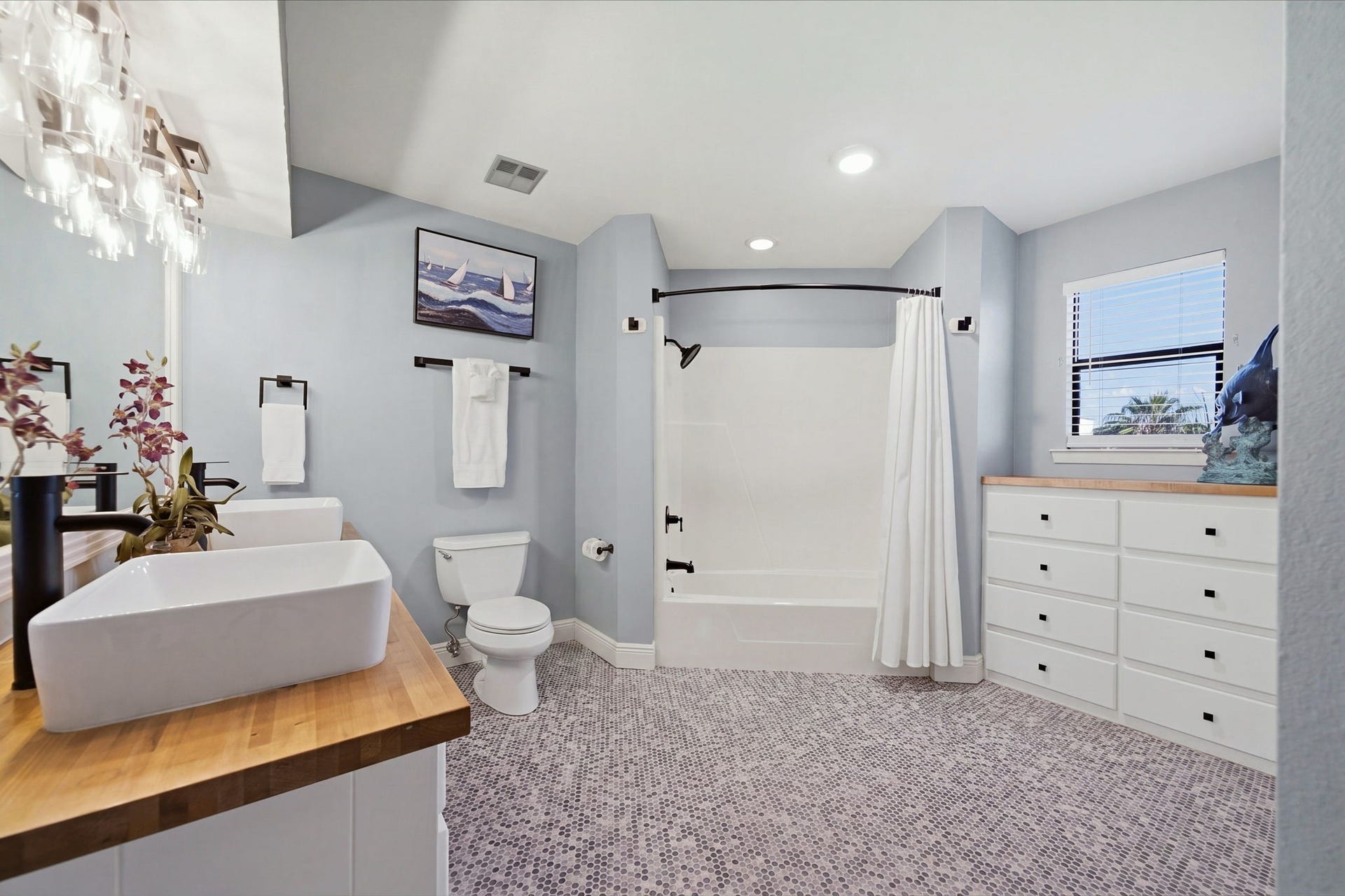 Primary bathroom with GORGEOUS  remodel, feels really spacious.