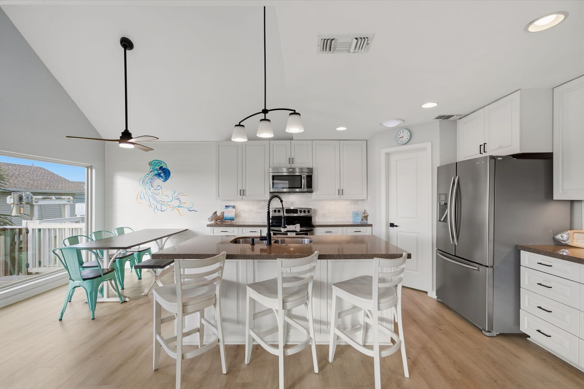 Kitchen & dining area is open & inviting for small or large parties.