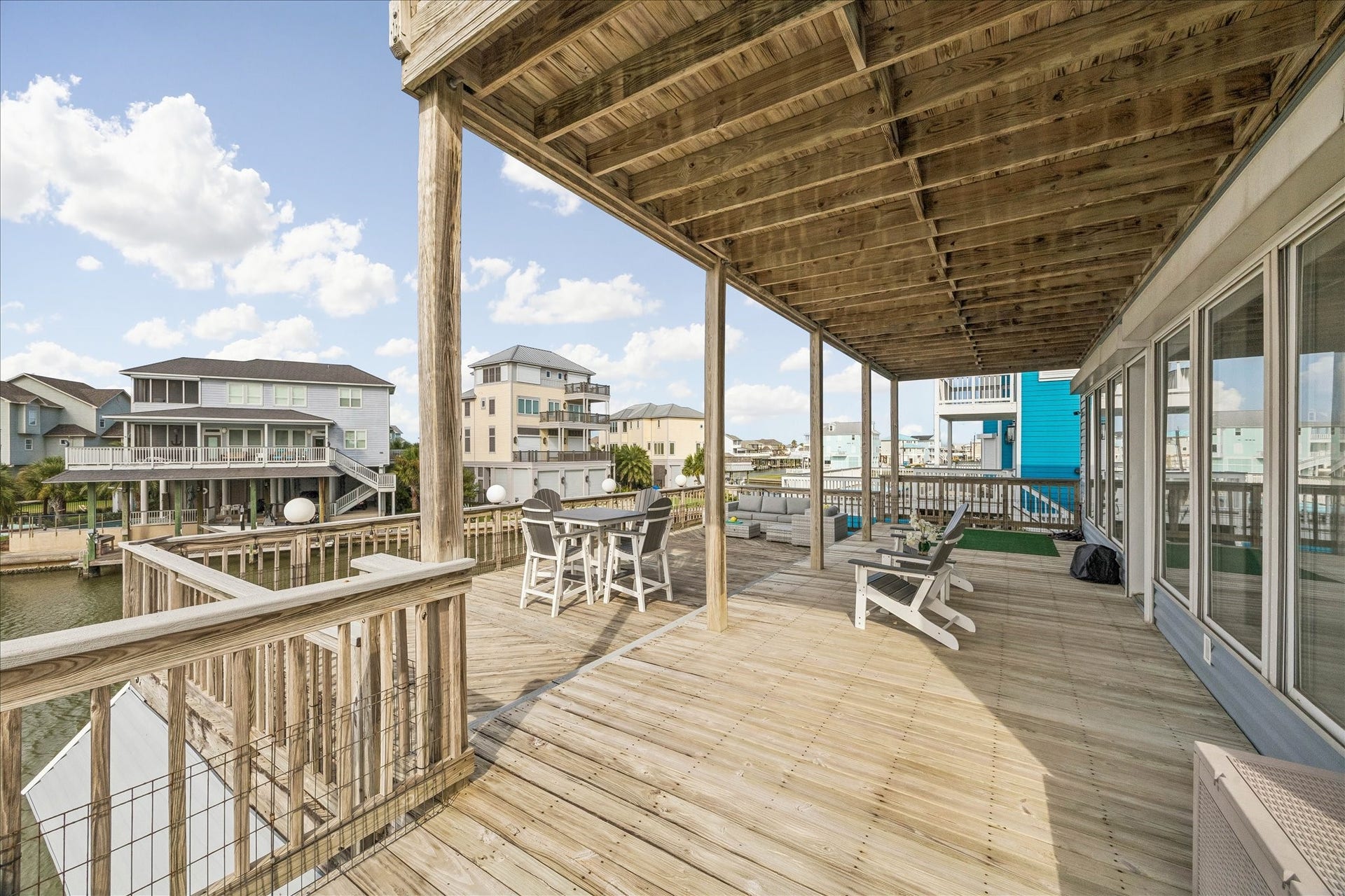 426 Sunset Circle, Tiki Island, TX 77554 The ideal spot for relaxing, entertaining, and watching the sunset over the water.