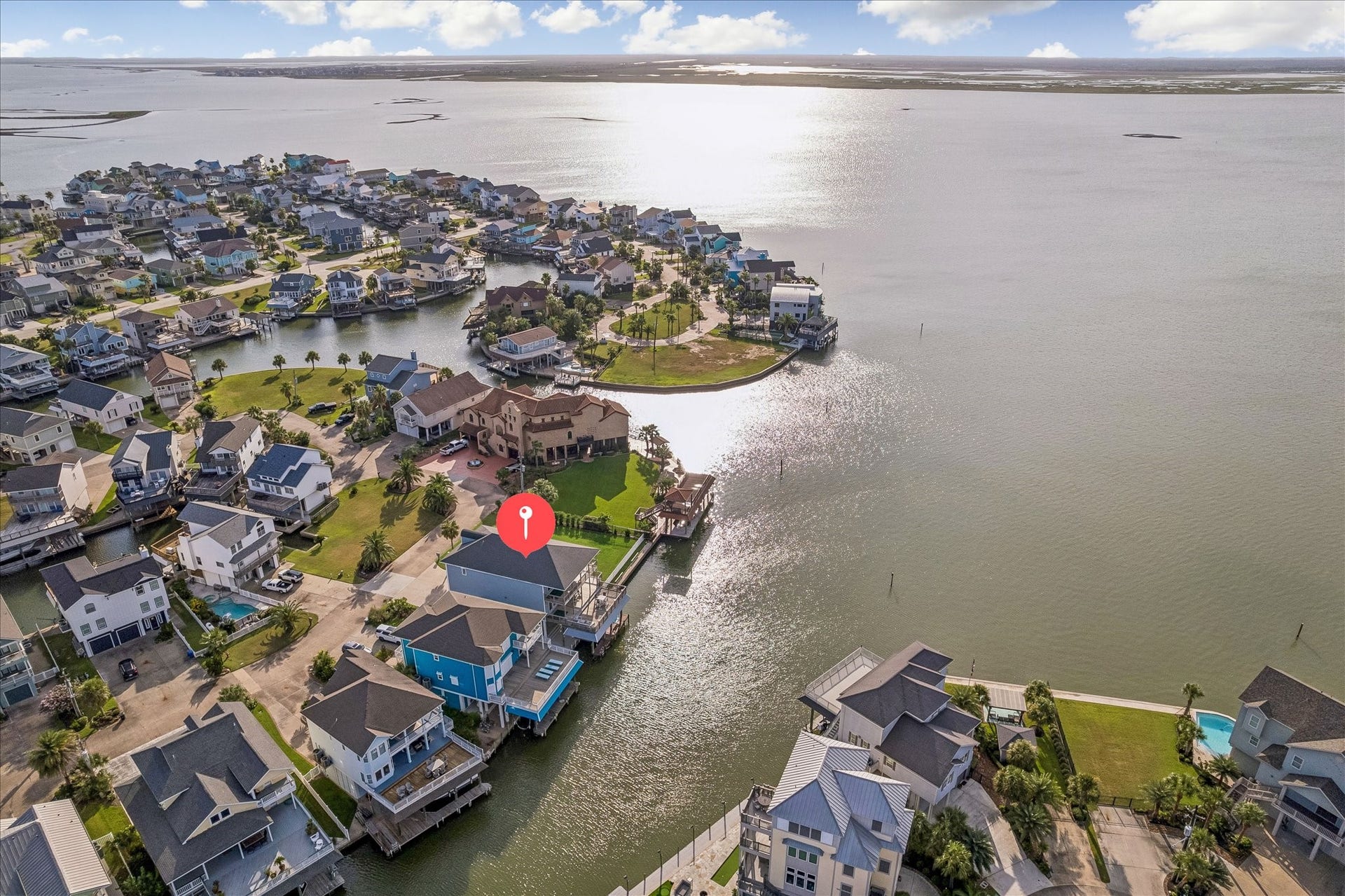 426 Sunset Circle, Tiki Island, TX 77554 Enjoy breathtaking Bay sunsets from the waterfront, with easy access to the Bay system for boating, fishing, and days spent on the water.
