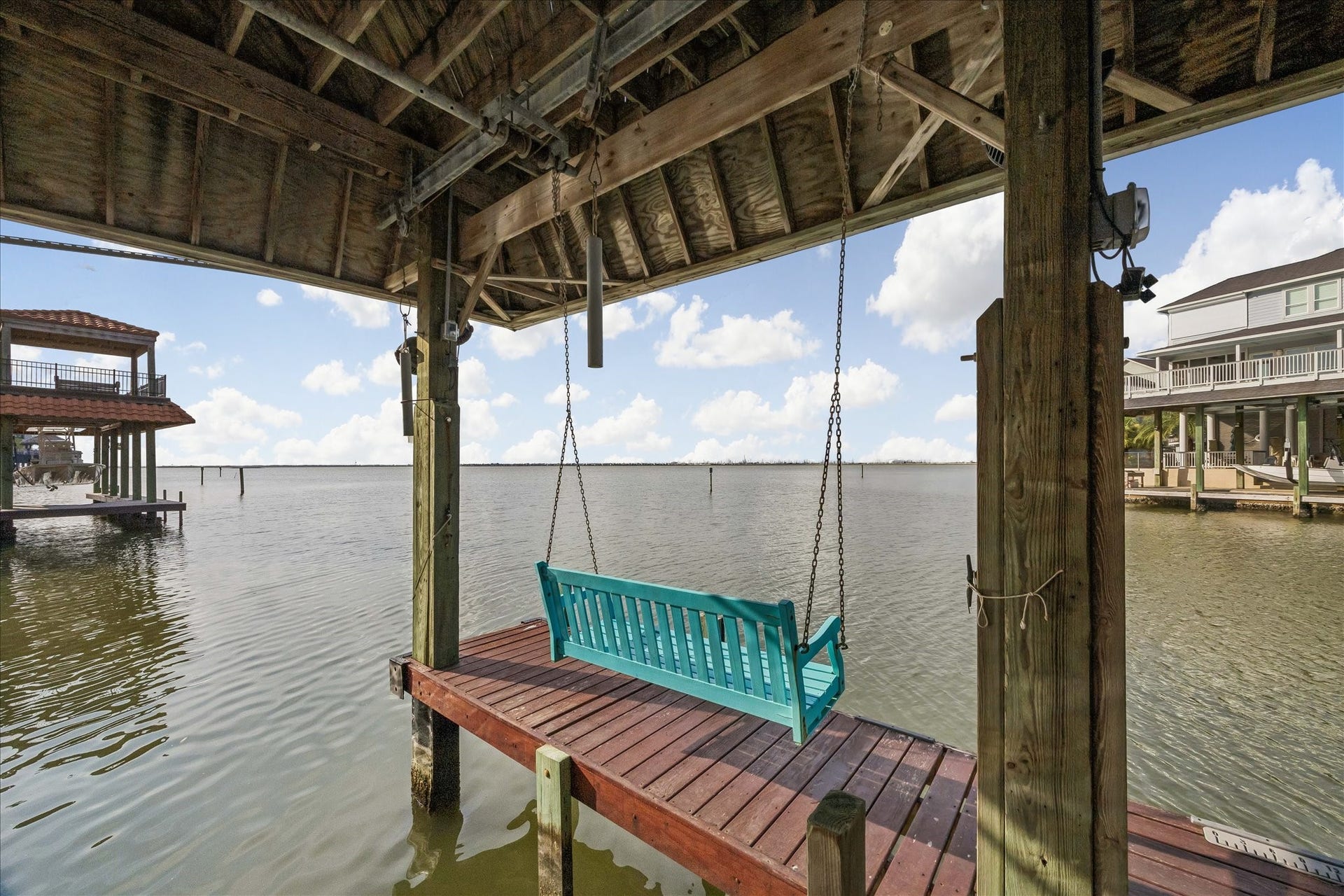 426 Sunset Circle, Tiki Island, TX 77554 Sittin' on the Dock of the Bay...Watching the Tide Roll Away...