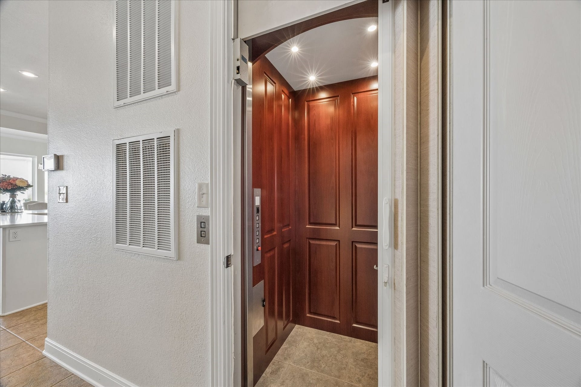 426 Sunset Circle, Tiki Island, TX 77554 In home ELEVATOR provides access to all levels for added convenience & for groceries!