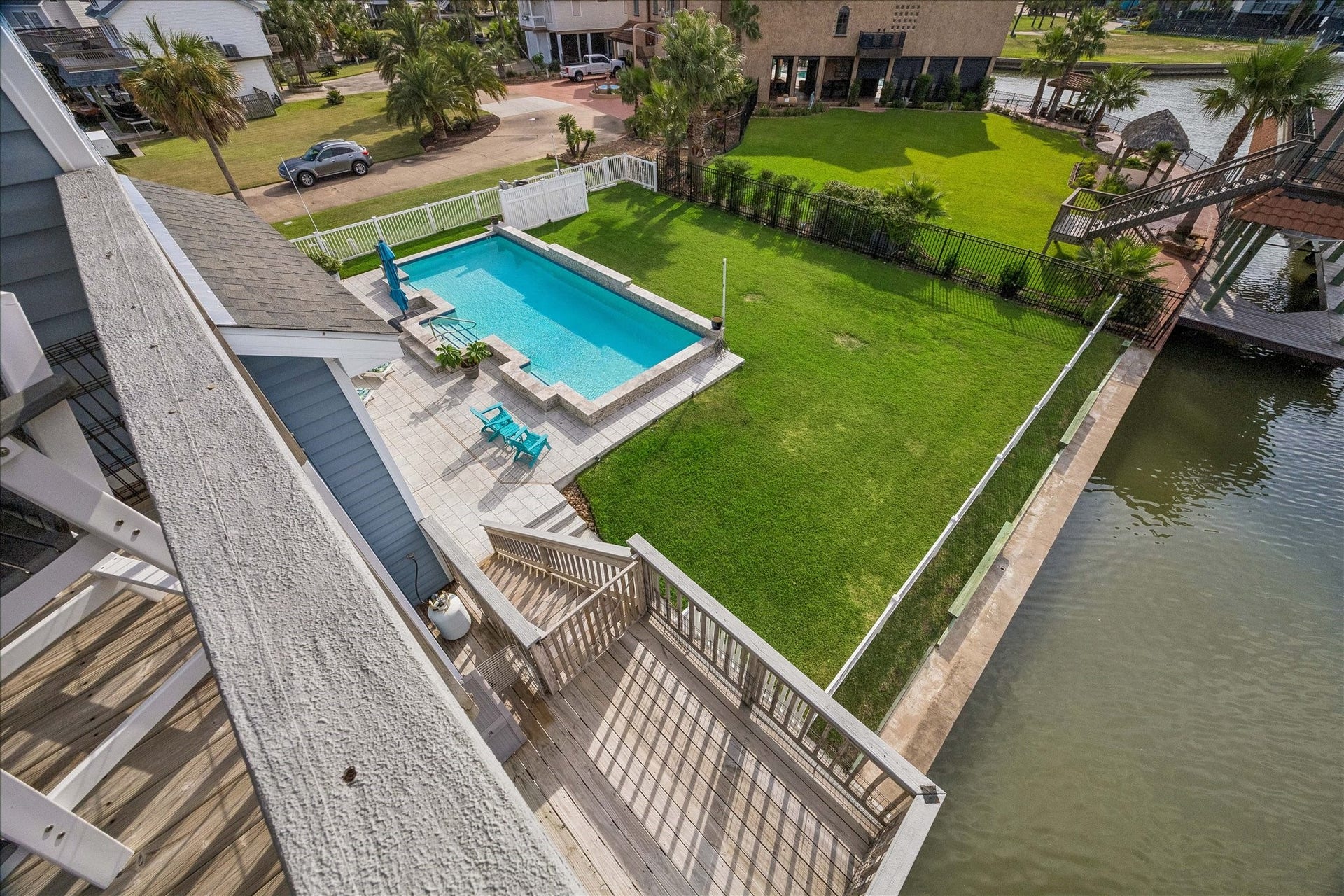 426 Sunset Circle, Tiki Island, TX 77554 Take a look at your massive yard and pool, complete with a beautiful waterfall feature and fully fenced groundsan inviting setting for relaxing, entertaining, and enjoying an amazing waterfront lifestyle!