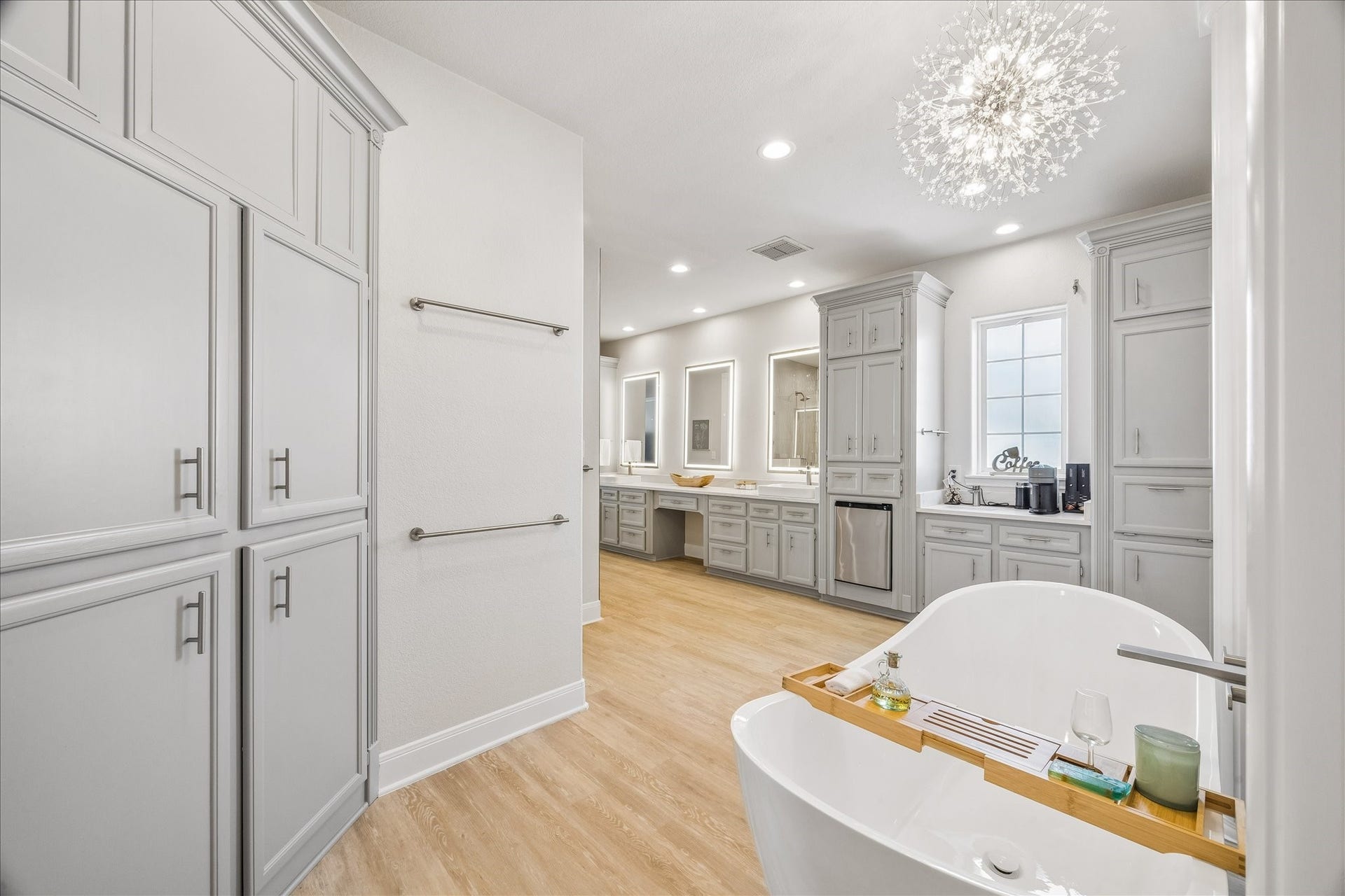 426 Sunset Circle, Tiki Island, TX 77554 1st Primary bathroom with beverage fridge & coffee bar.