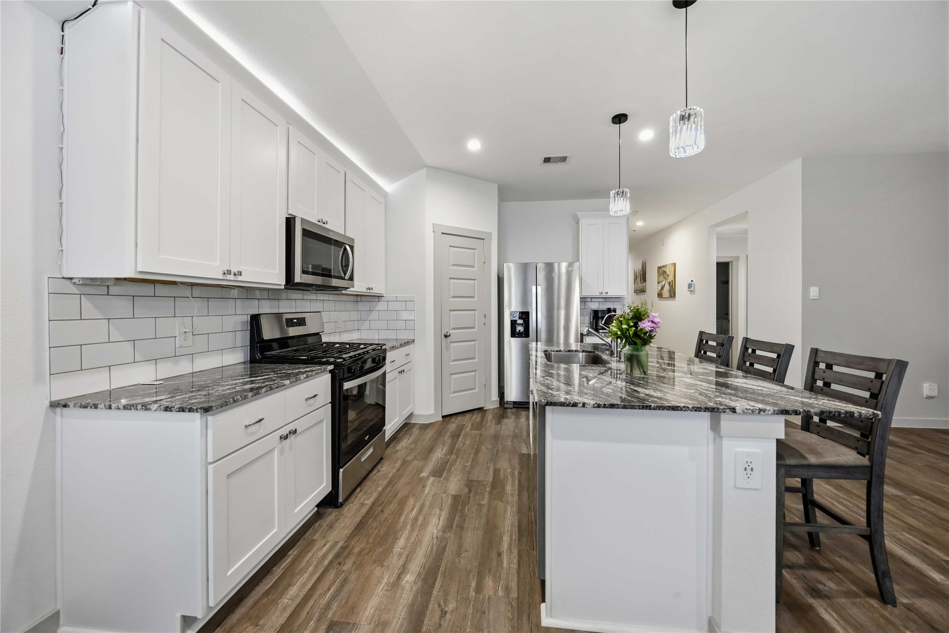 1029 Great Barracuda Lane, Alvin, TX 77511 The island also offers electrical plugs for convenience.