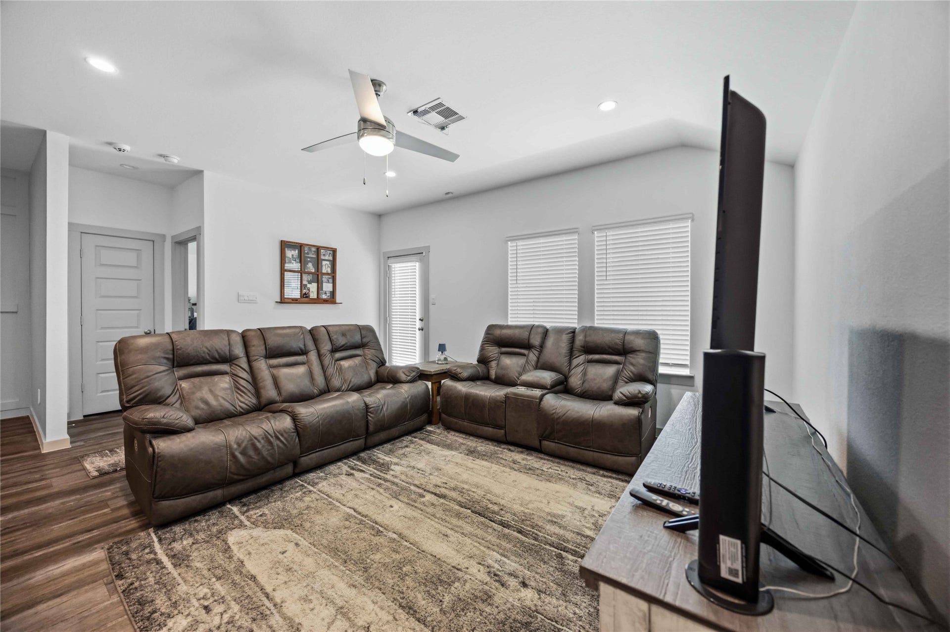 1029 Great Barracuda Lane, Alvin, TX 77511 The living room is spacious enough for the whole family plus some.