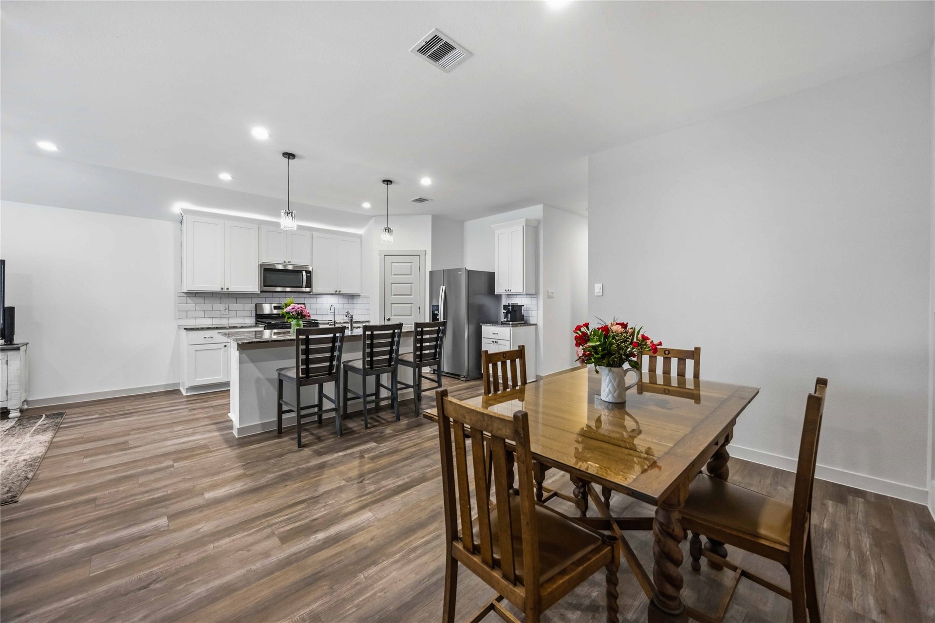 1029 Great Barracuda Lane, Alvin, TX 77511 The dining room shows just how open the floor plan is.