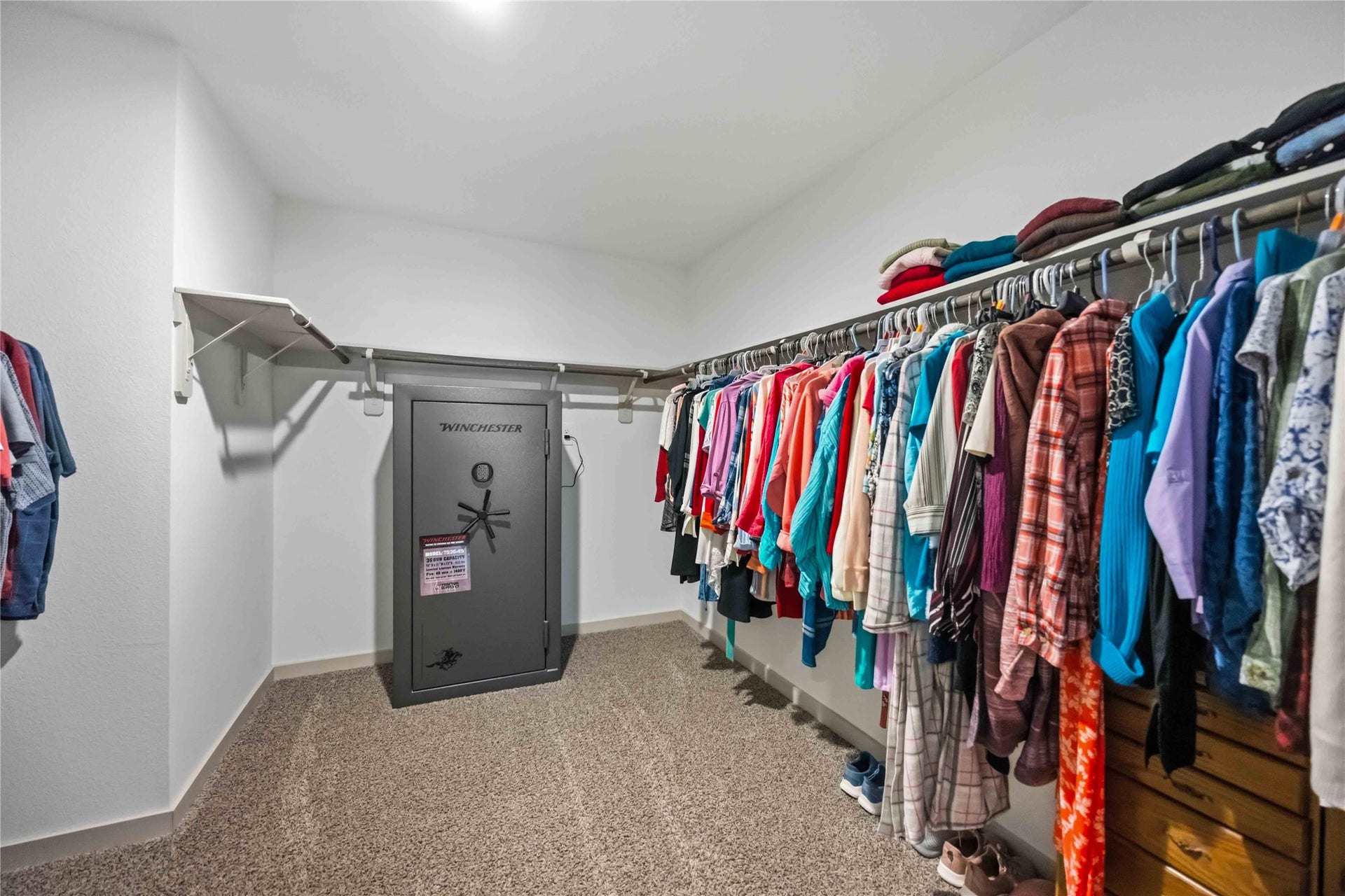 1029 Great Barracuda Lane, Alvin, TX 77511 This closet is big enough for ALL your things... Including a safe or two.