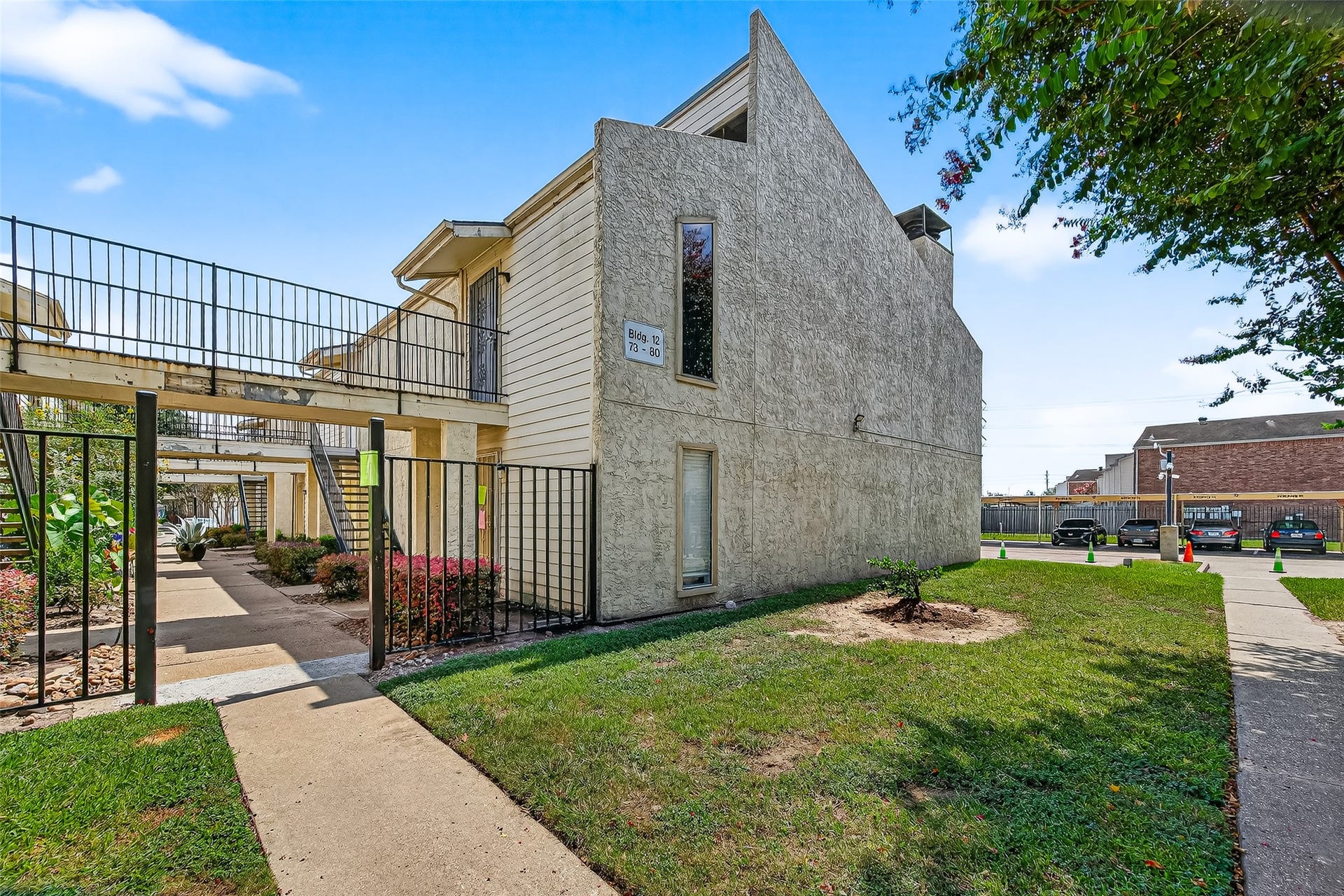 10075 Westpark Drive, #73, Houston, TX 77042 Convenient corner unit with easy parking access.