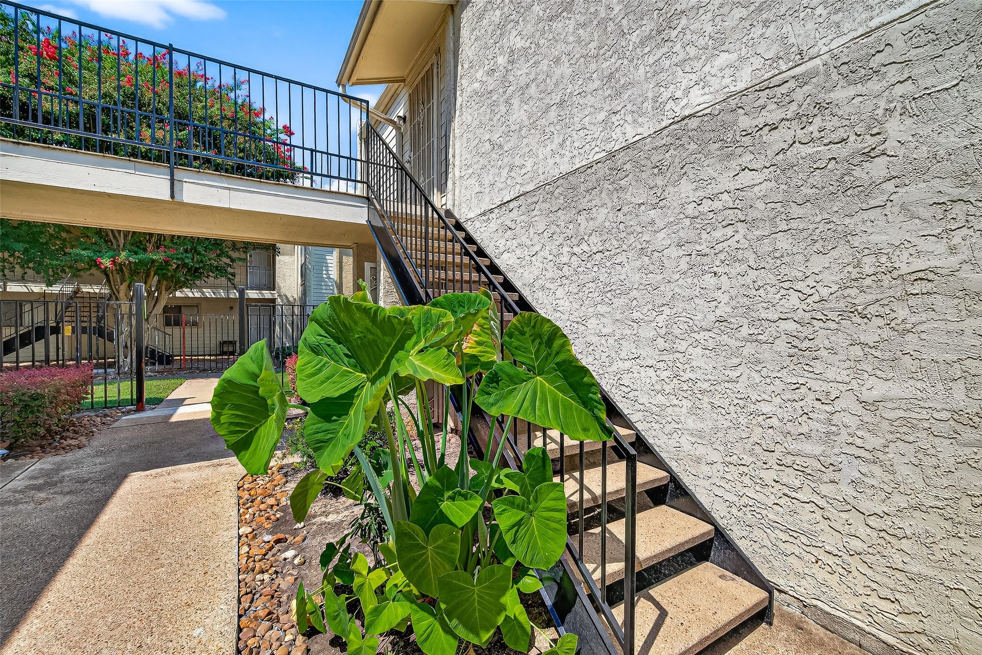 10075 Westpark Drive, #73, Houston, TX 77042 Stairs going up to the condo on the left.