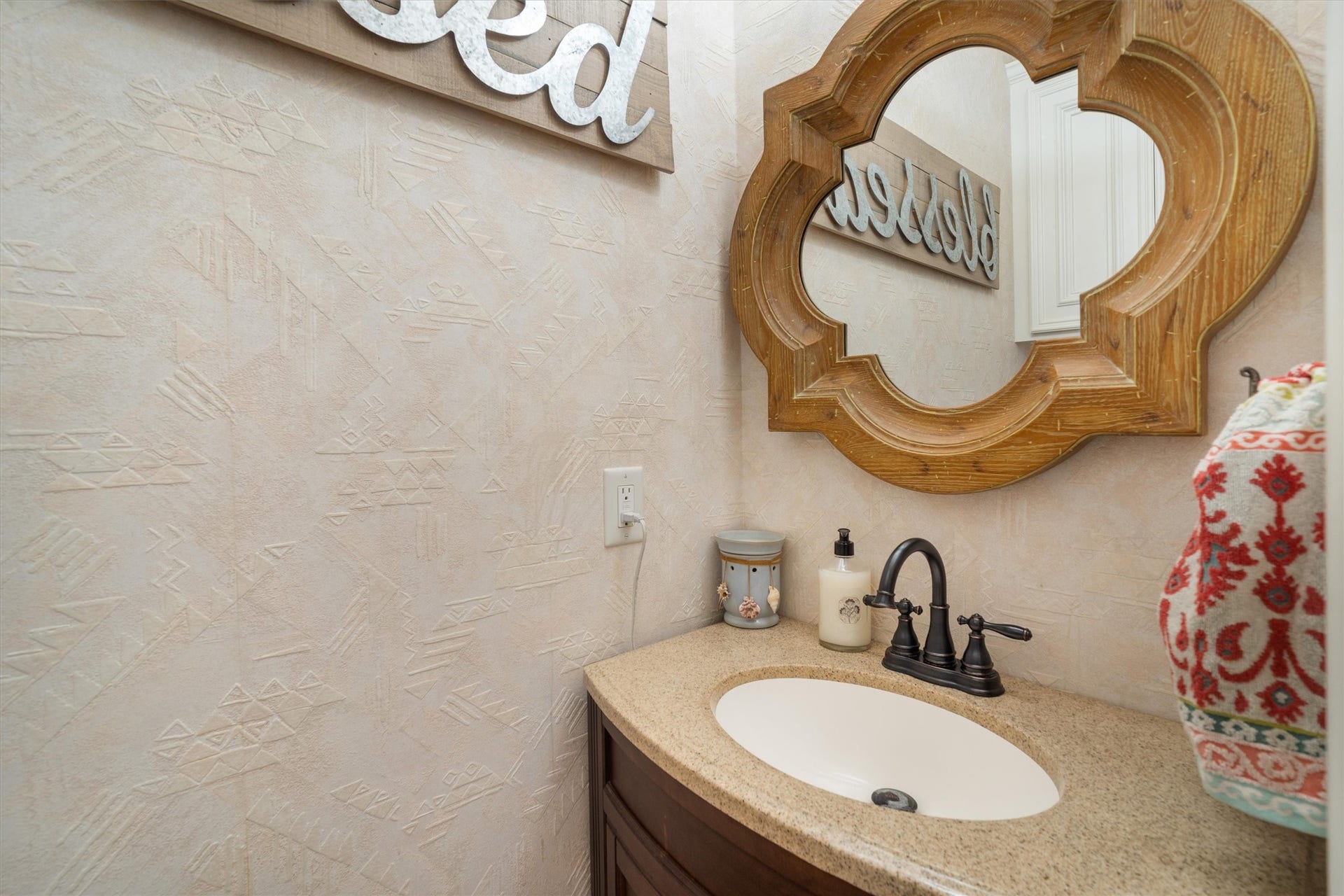 2150 Hewitt Street, League City, TX 77573 Half bath with framed mirror