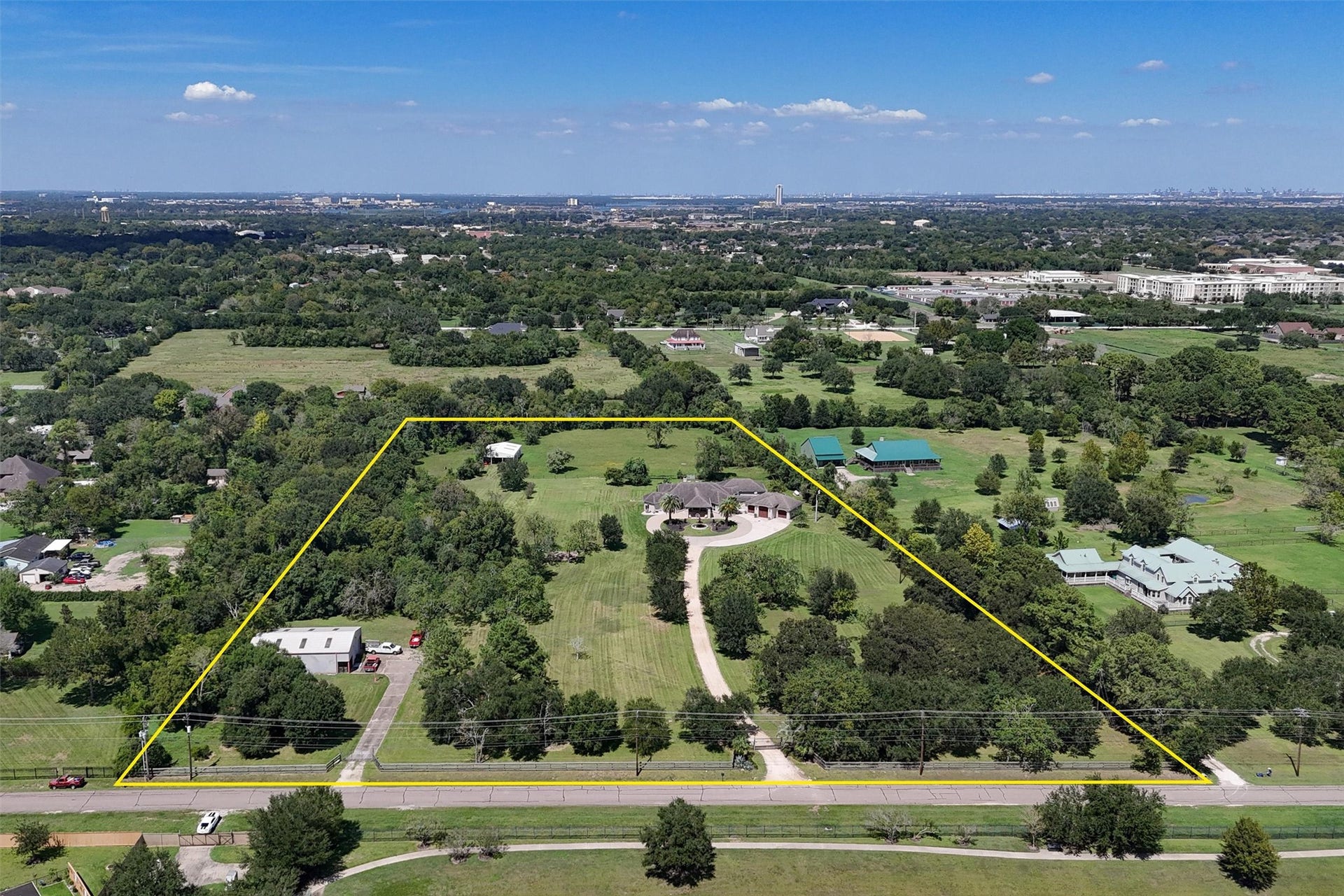 2150 Hewitt Street, League City, TX 77573 One-of-a-kind treasure, quaintly situated on 11 acres of prime real estate, in the heart of League City!