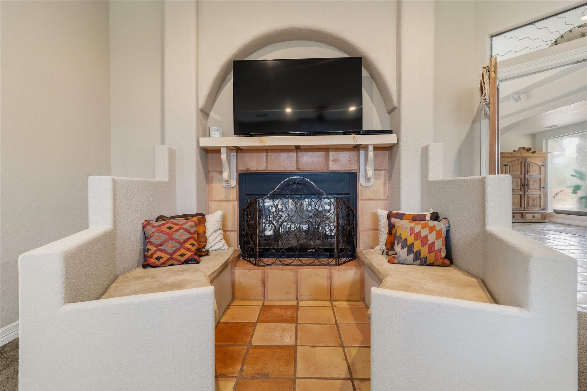 2150 Hewitt Street, League City, TX 77573 Adorable seating area around the cozy fireplace in the primary bedroom
