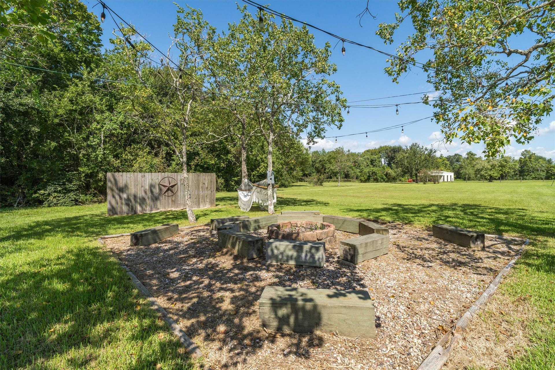 2150 Hewitt Street, League City, TX 77573 Firepit overlooking the 10 acre property