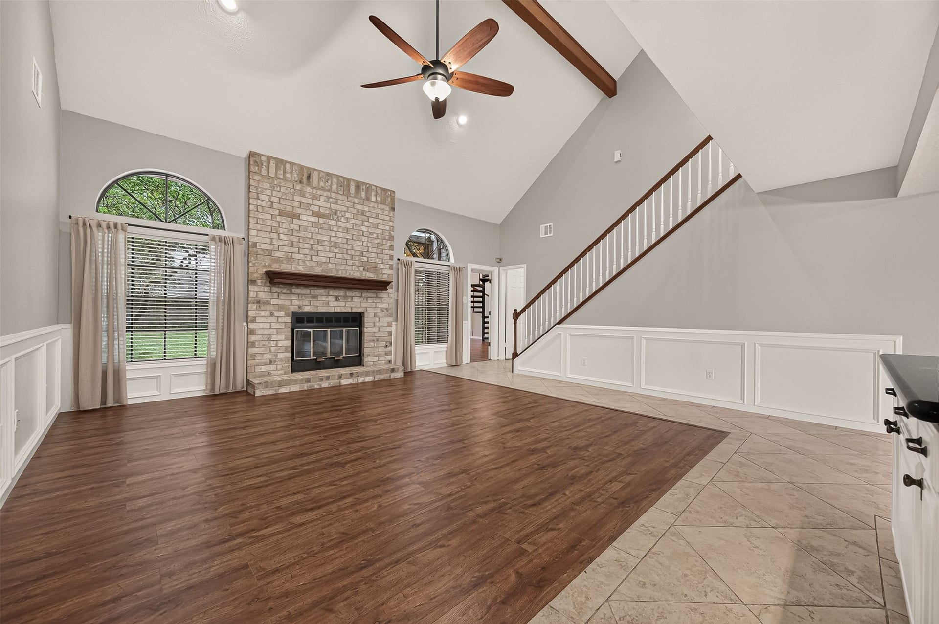 16405 Smith Street, Jersey Village, TX 77040 Some rooms simply invite traditions, and this is one of them. Whether it's a beautifully decorated tree beside the fireplace during the holidays, stockings displayed along the mantel, or children eagerly racing downstairs on special mornings, this welcoming family room is ready to become the backdrop for memories your family will treasure for years to come.