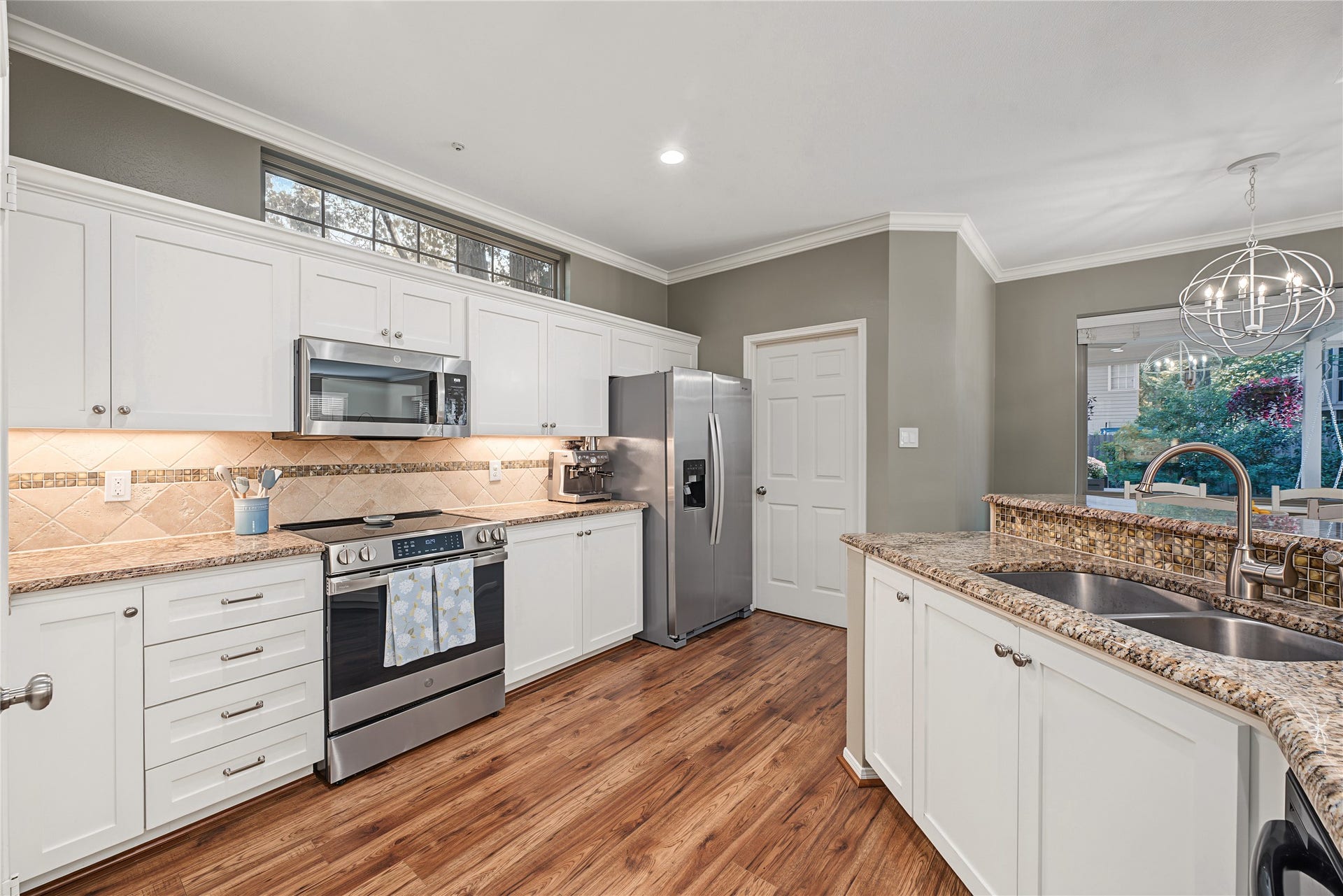 5 Otter Pond Place, The Woodlands, TX 77381 The door shown here opens to a laundry room offering convenient backyard access.