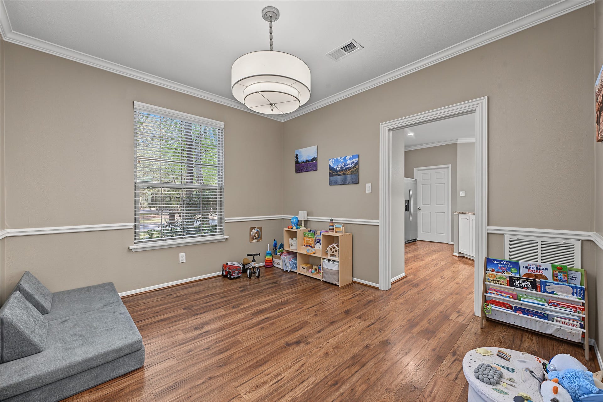 5 Otter Pond Place, The Woodlands, TX 77381 Formal dining room off of the kitchen also functions perfectly as a playroom.