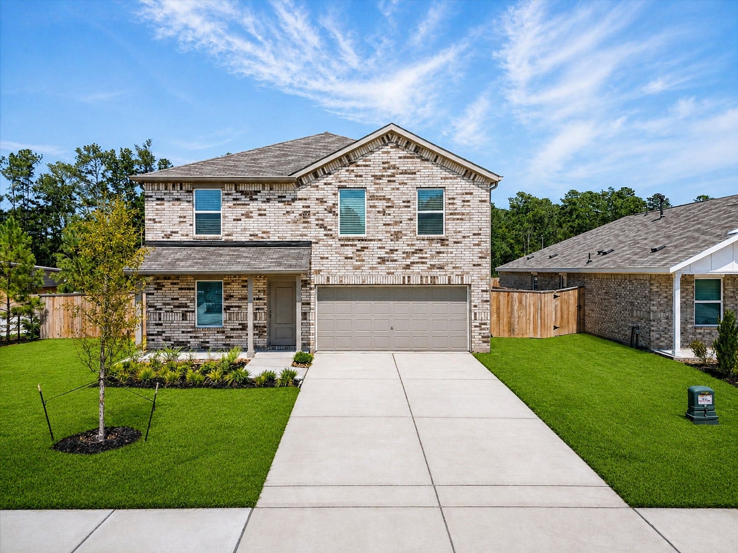 6107 Daintree Court, Montgomery, TX 77316 Welcome home! This beautiful 2025-built home offers an inviting first impression with great curb appeal and a spacious corner-lot setting. Grass has been virtually enhanced.