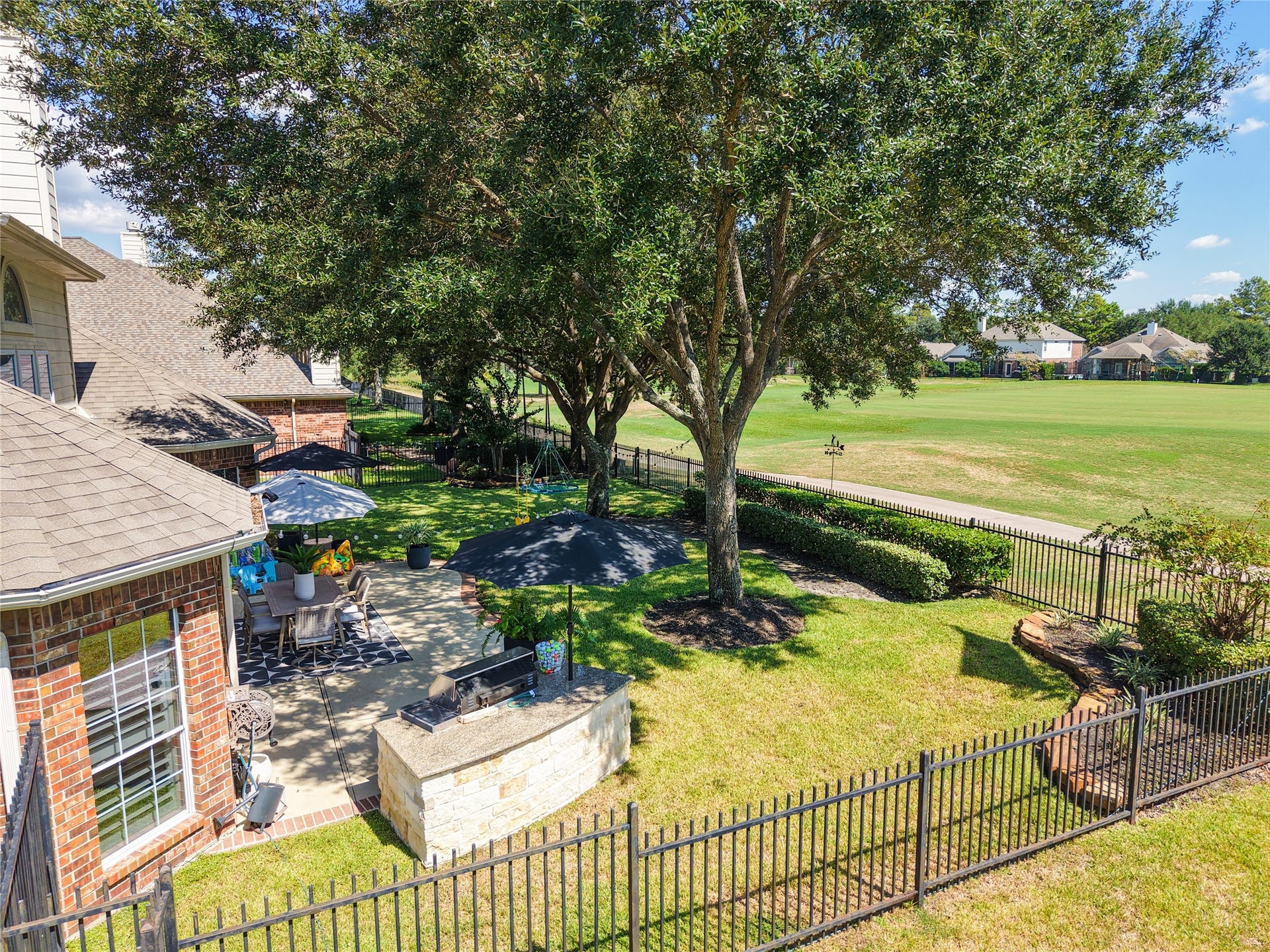 16511 E Canterra Circle, Houston, TX 77095 Drone view of backyard looking towards golf course