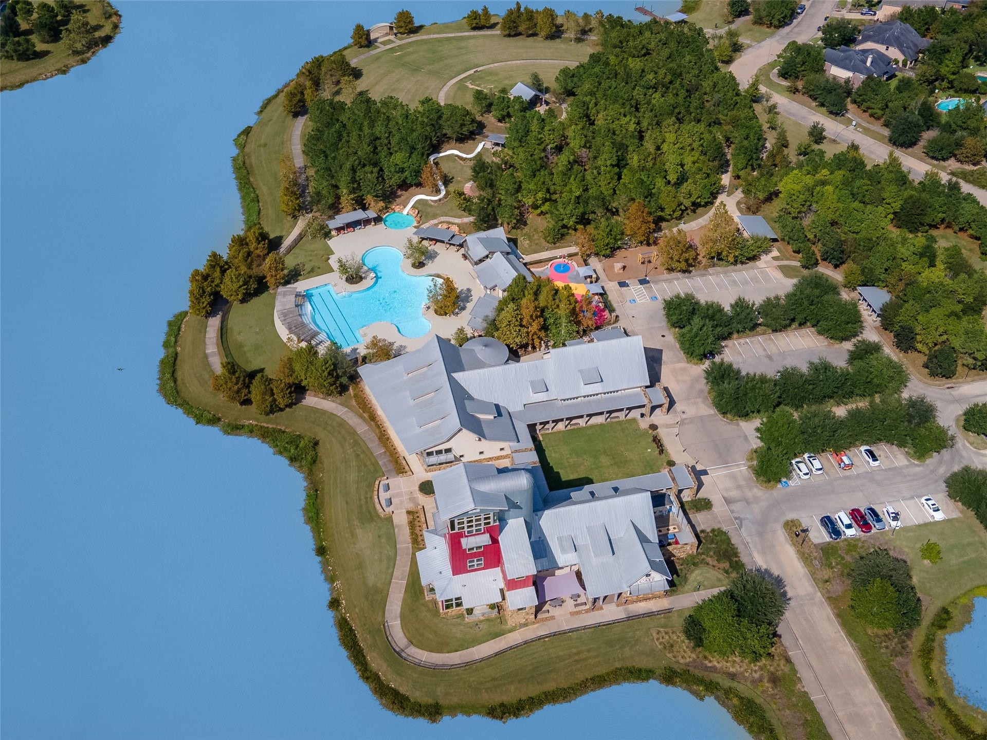 Aerial view of the main amenity center, home to Local Spot  the perfect place for outdoor dining or a quick bite after a dip in the pool.
