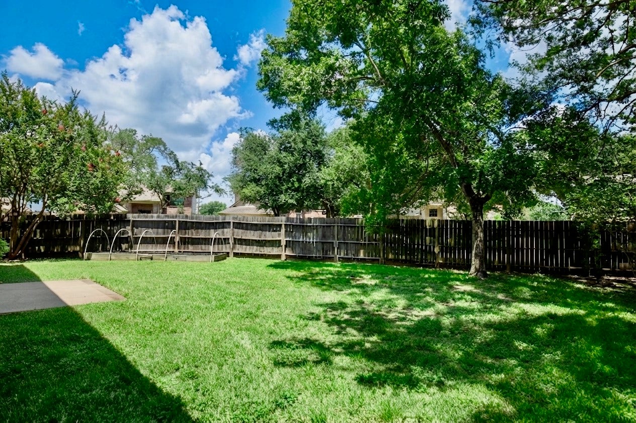 3007 Rimrock Drive, Missouri City, TX 77459 THIS PRIVATE BACKYARD IS ENORMOUS, FULLY FENCED, WRAPPED IN LUSH LANDSCAPING, AND LINED WITH MATURE TREES!!!