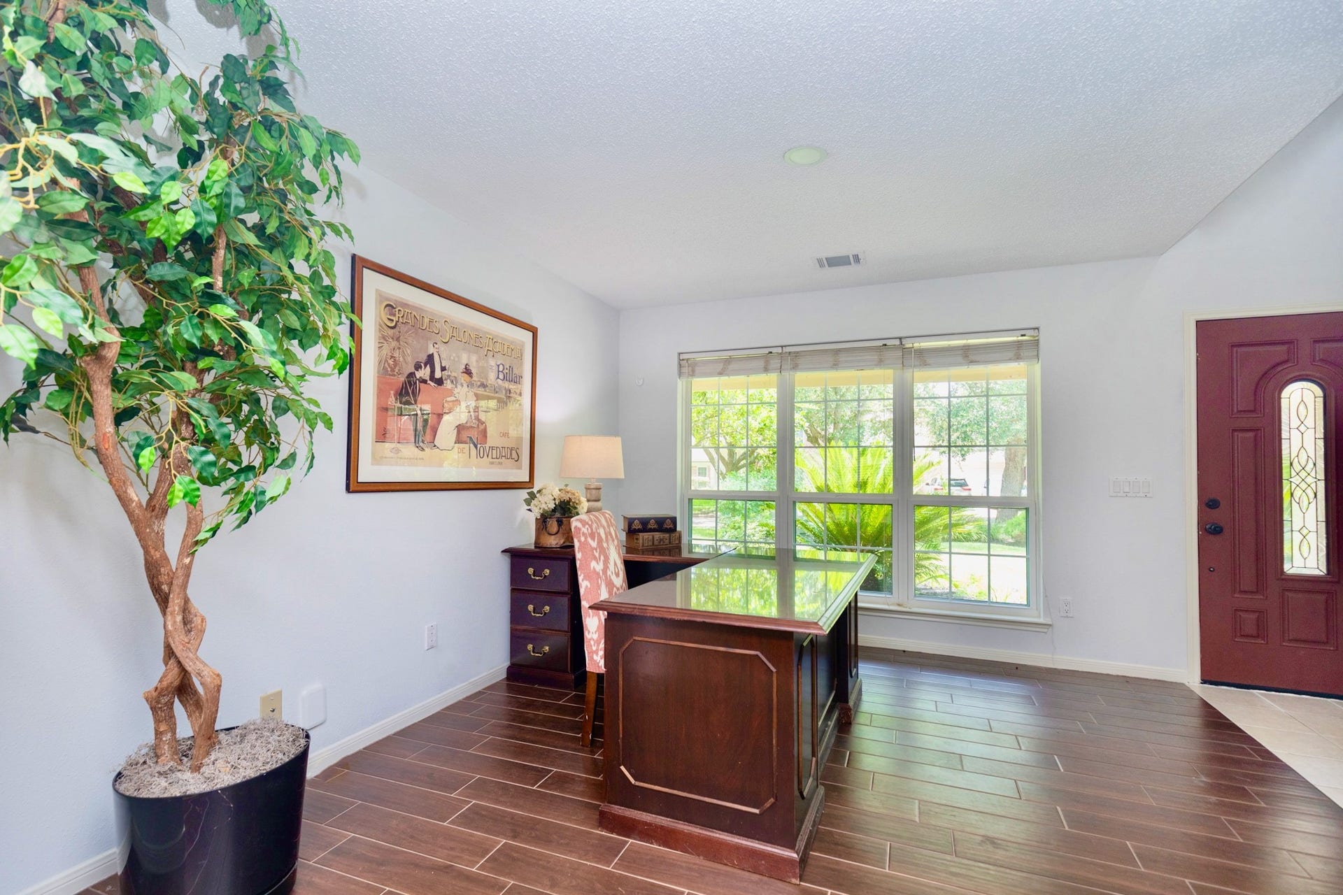 3007 Rimrock Drive, Missouri City, TX 77459 THE FORMAL OFFICE, JUST OFF THE DINING, IS SPACIOUSBOASTING LUXURIOUS TILE AND A BEAUTIFUL WOOD-FACADE FLOORING FEATURE!!!