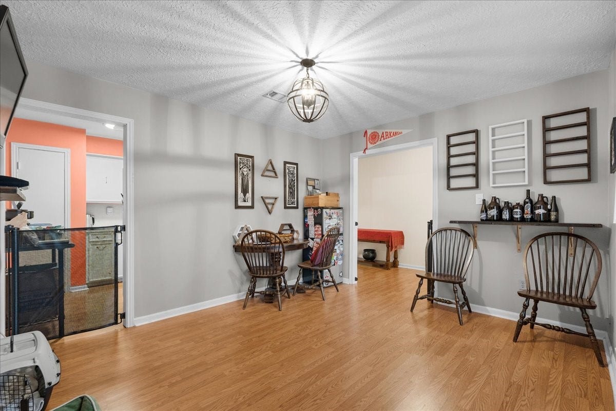 214 Oakwood Street, League City, TX 77573 Dining area with decorative lighting, and flexible space for everyday meals.