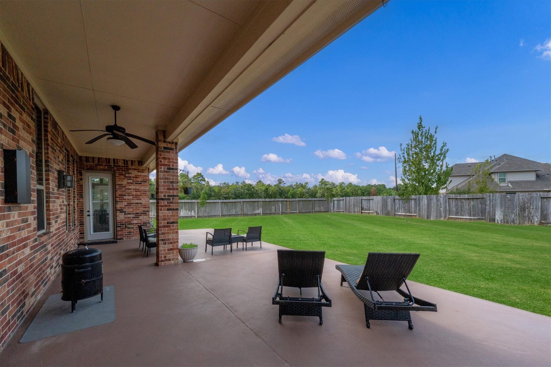17903 Fernwood Bend Drive, Tomball, TX 77377 Chilling and grilling your style? You've got room for a smoker, gas grill, charcoal grill, AND outdoor griddle on this patio.