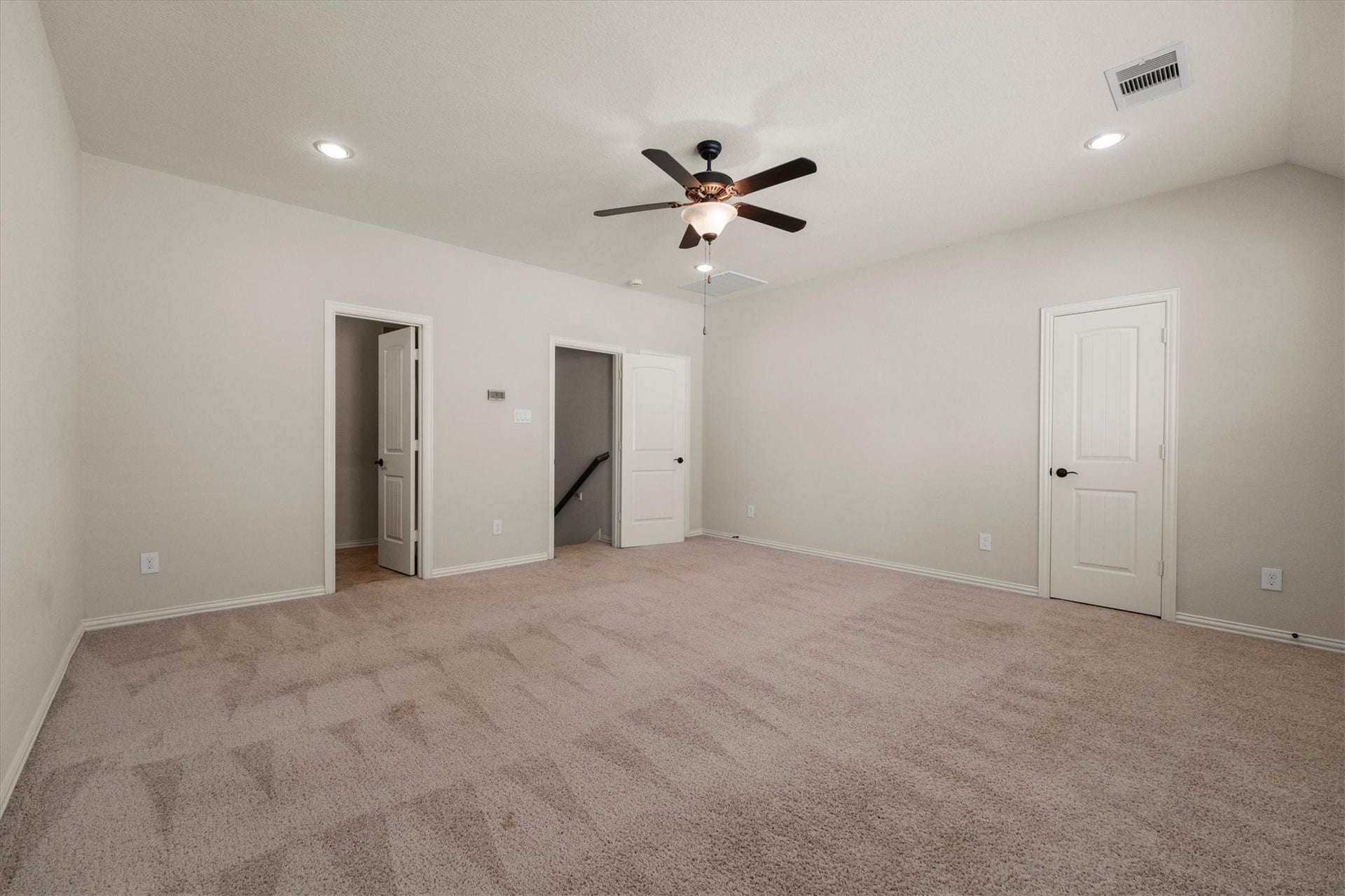 17903 Fernwood Bend Drive, Tomball, TX 77377 A door to downstairs seals the room for privacy while the full bath does the full bath thing.