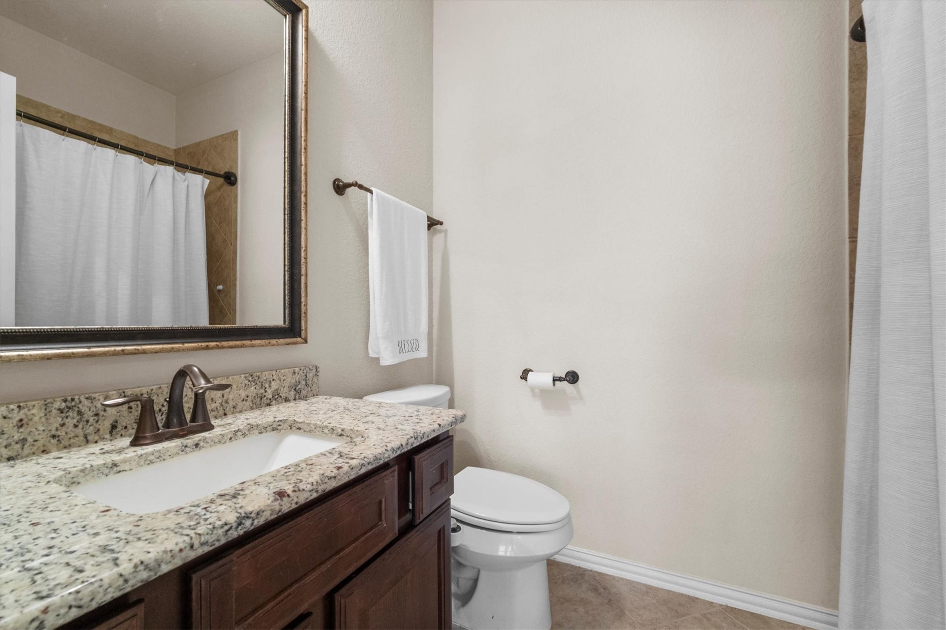 17903 Fernwood Bend Drive, Tomball, TX 77377 The shower/tub and granite topped vanity round out the ensuite upstairs.