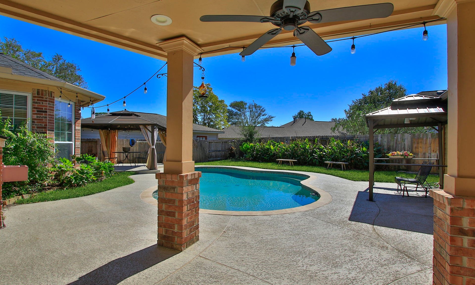 14303 Spyglen Lane, Cypress, TX 77429 A true backyard oasis with multiple covered spaces